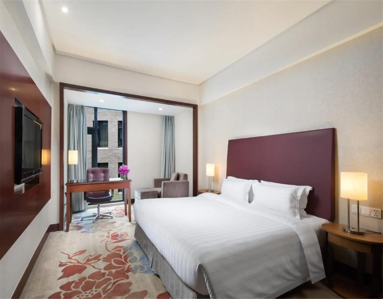 Bed in Ramada by Wyndham Beijing Airport
