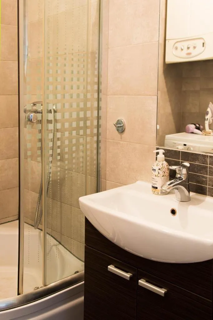 Shower in Florianska Gate Luxury Apartments