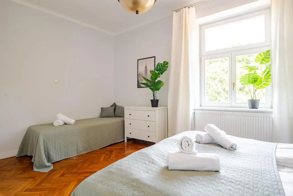 Bed in Florianska Gate Luxury Apartments