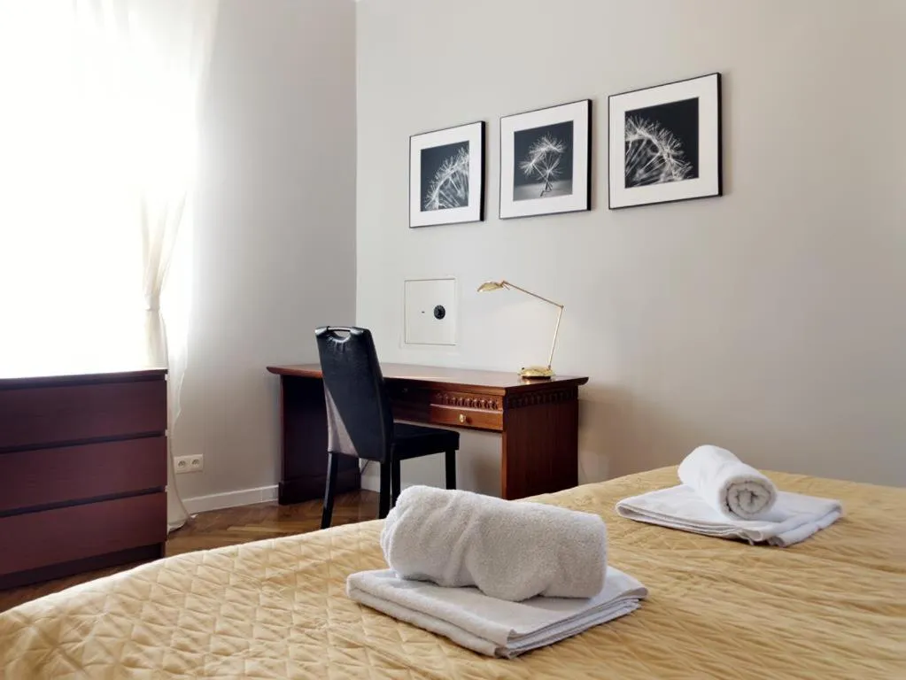 Bed in Florianska Gate Luxury Apartments