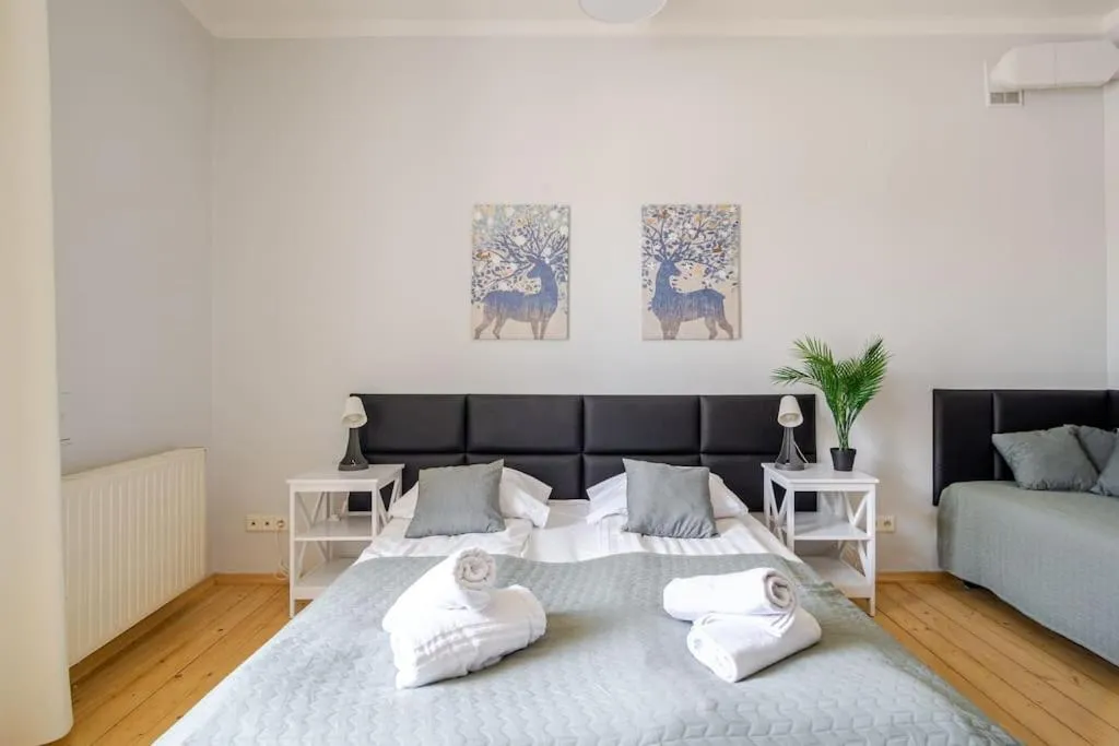 Bed in Florianska Gate Luxury Apartments