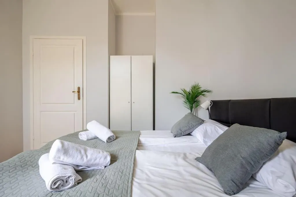 Bed in Florianska Gate Luxury Apartments