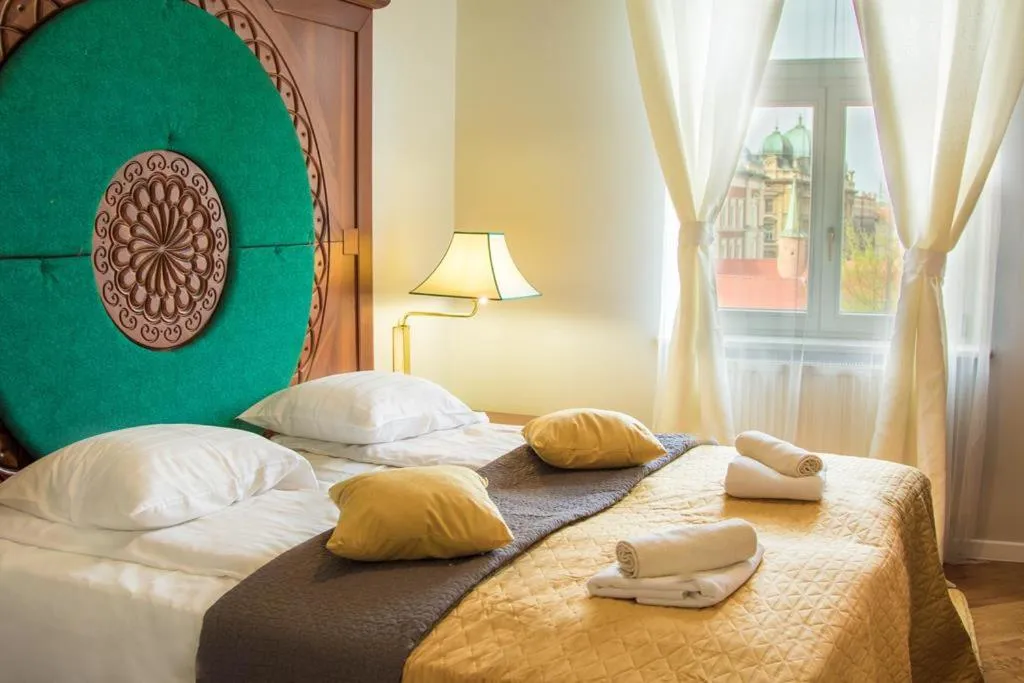 Bed in Florianska Gate Luxury Apartments