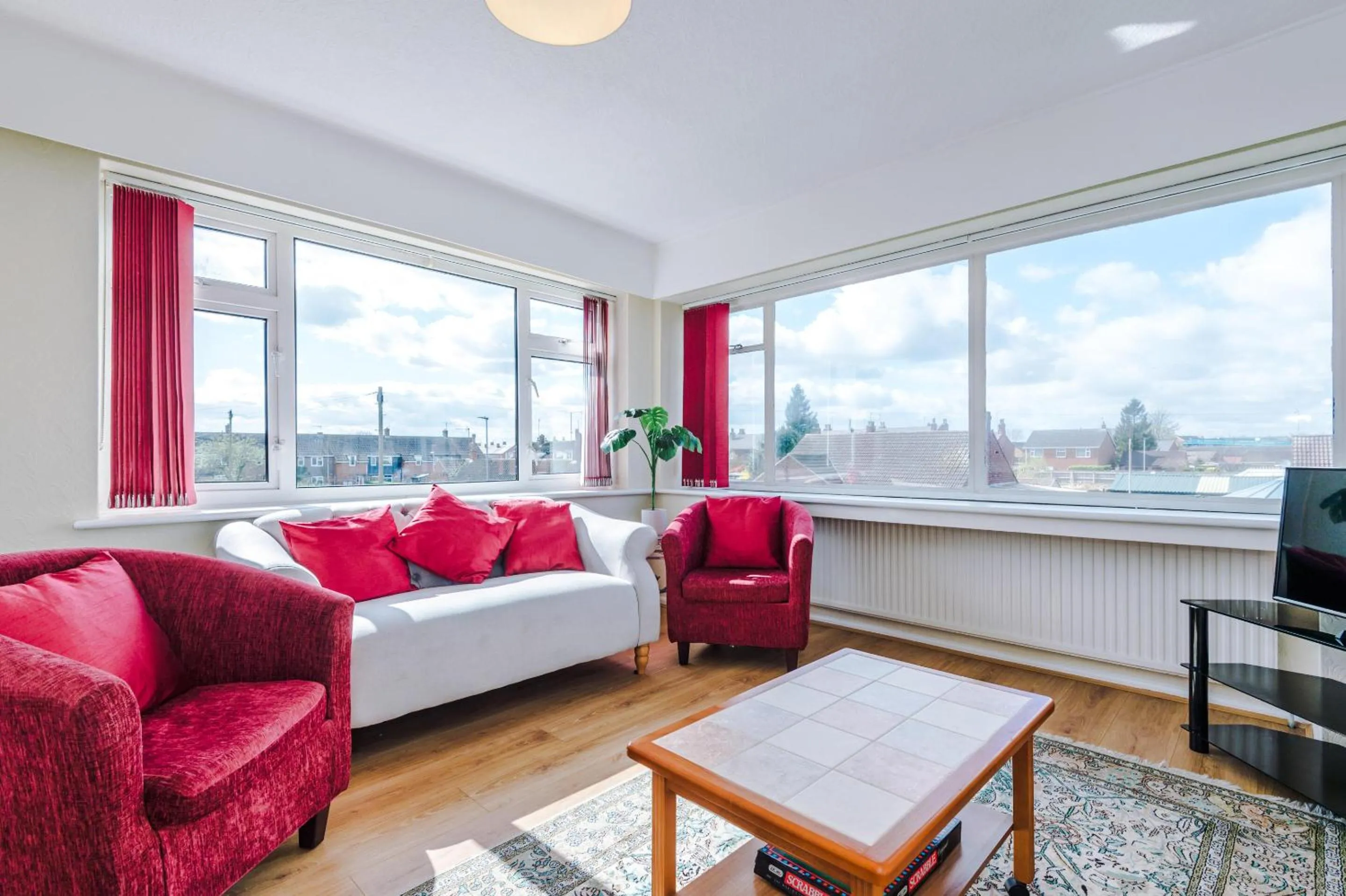 Living room in Holcombe Guest House