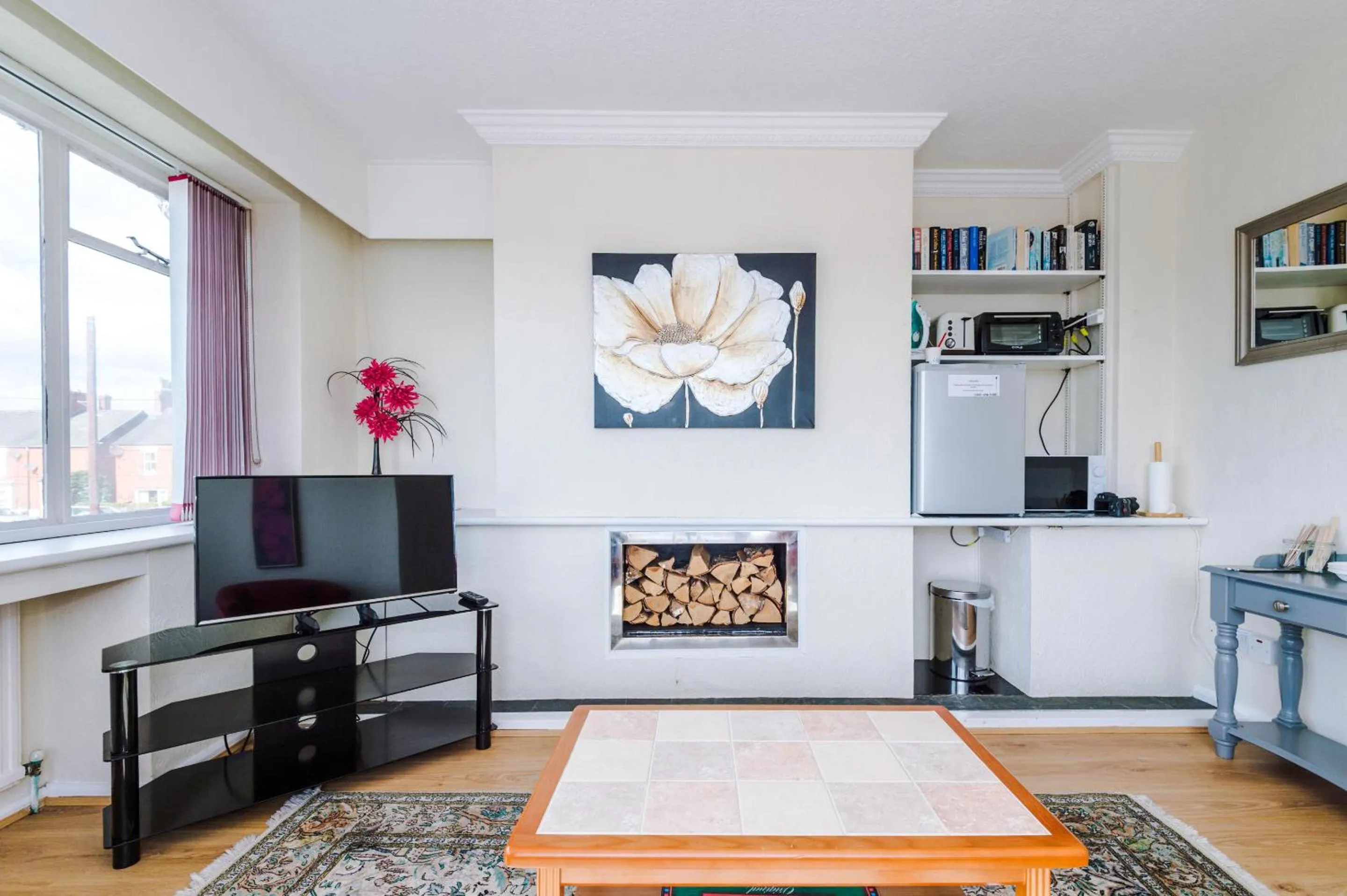 Living room in Holcombe Guest House