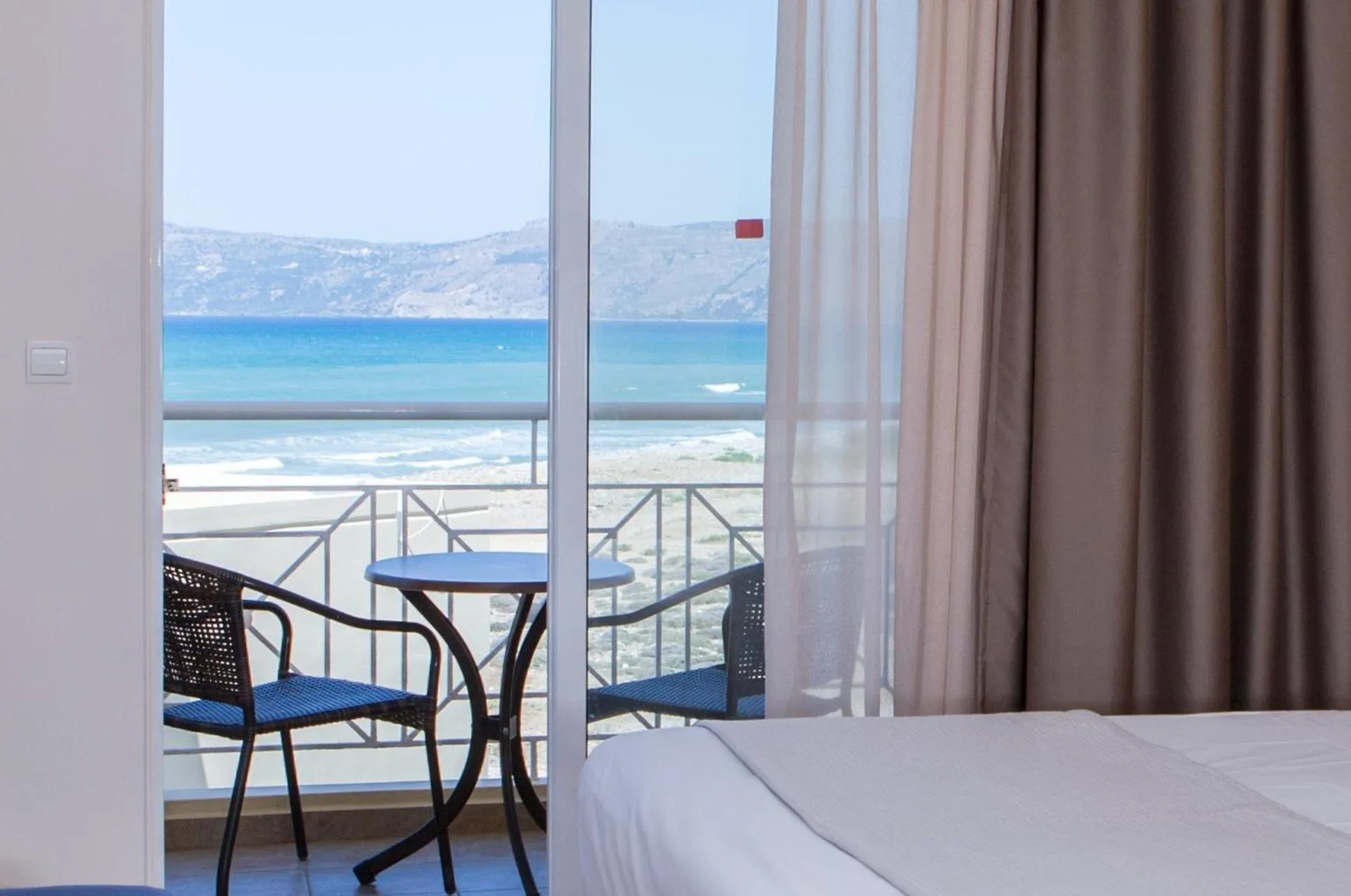 Balcony/Terrace, Bed in Sunny Bay Hotel