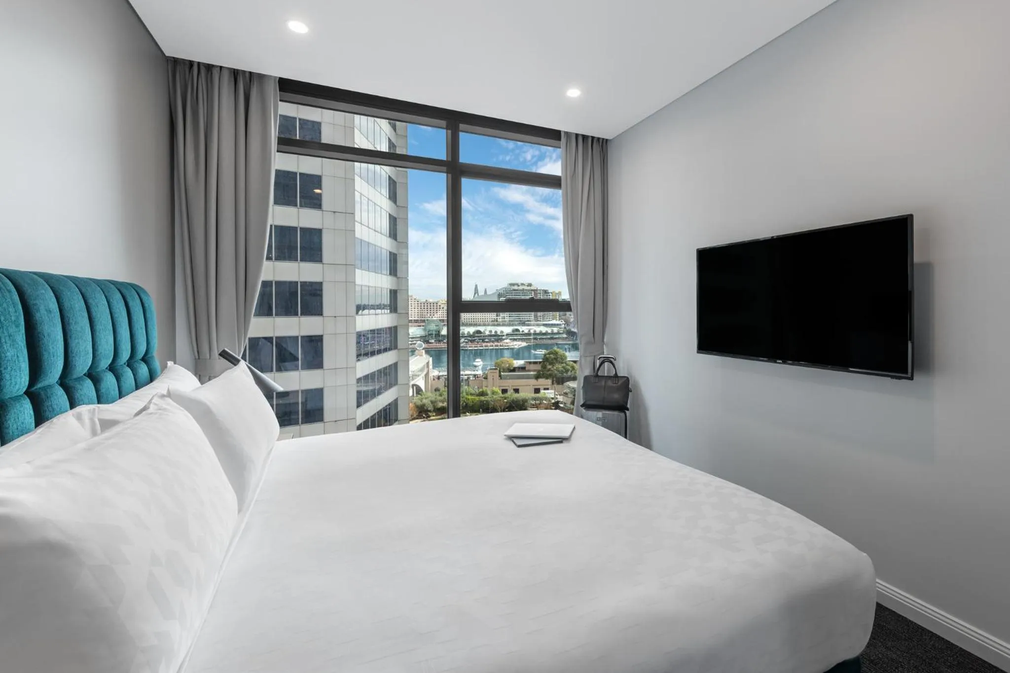 Bed in Meriton Suites Sussex Street, Sydney