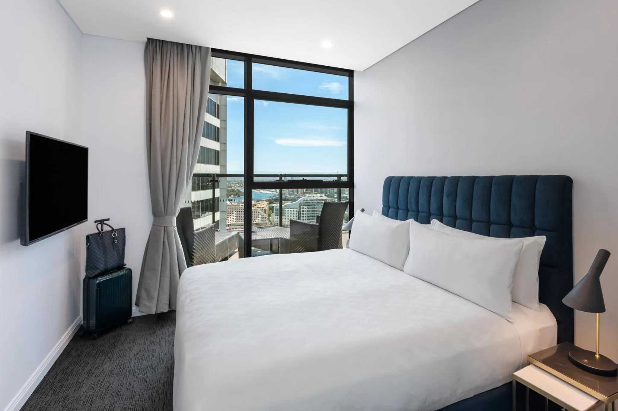 Bed in Meriton Suites Sussex Street, Sydney