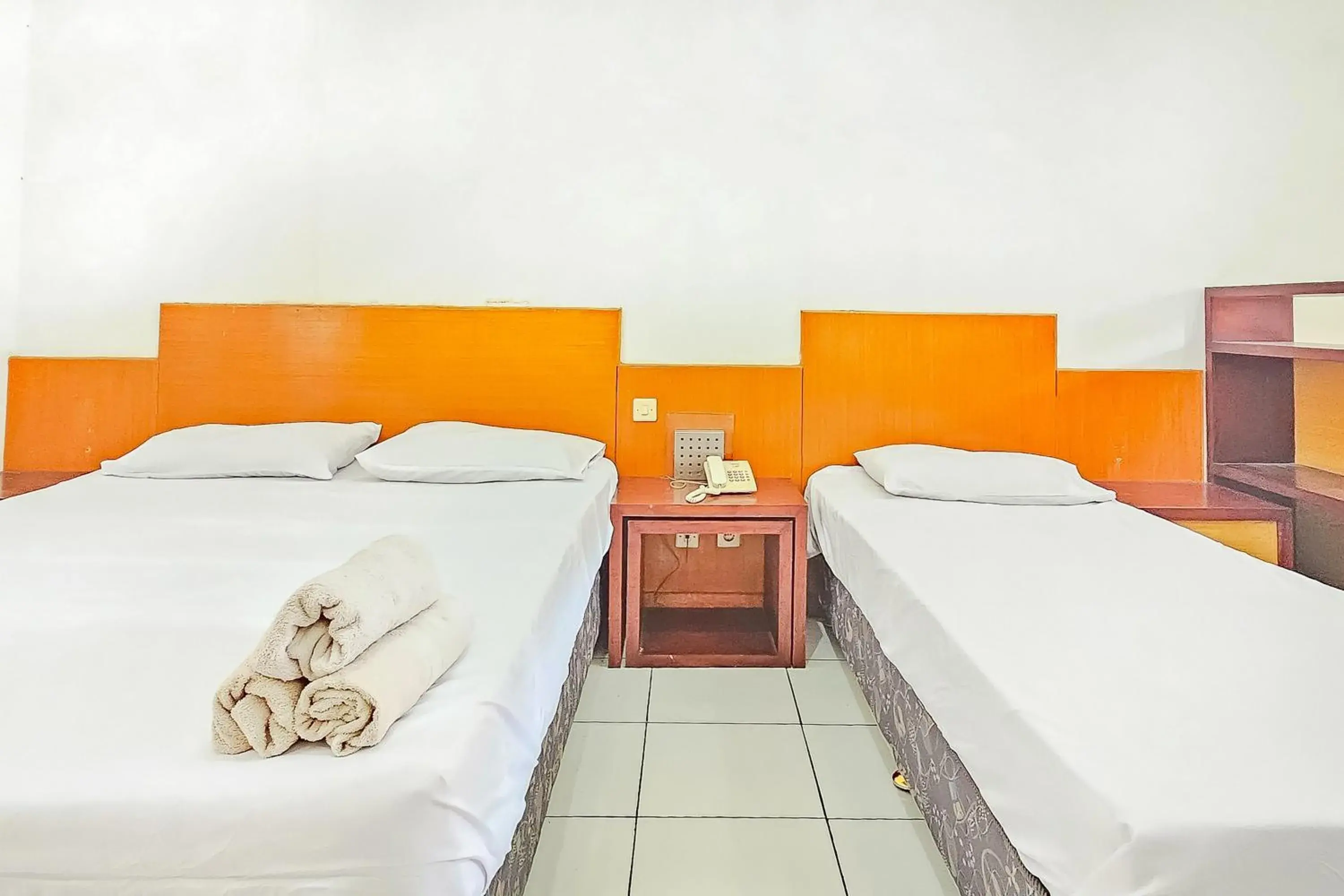 Bed in Pandu Prima Guest House Syariah Mitra Reddoorz Bed in Pandu Prima Guest House Syariah Mitra Reddoorz