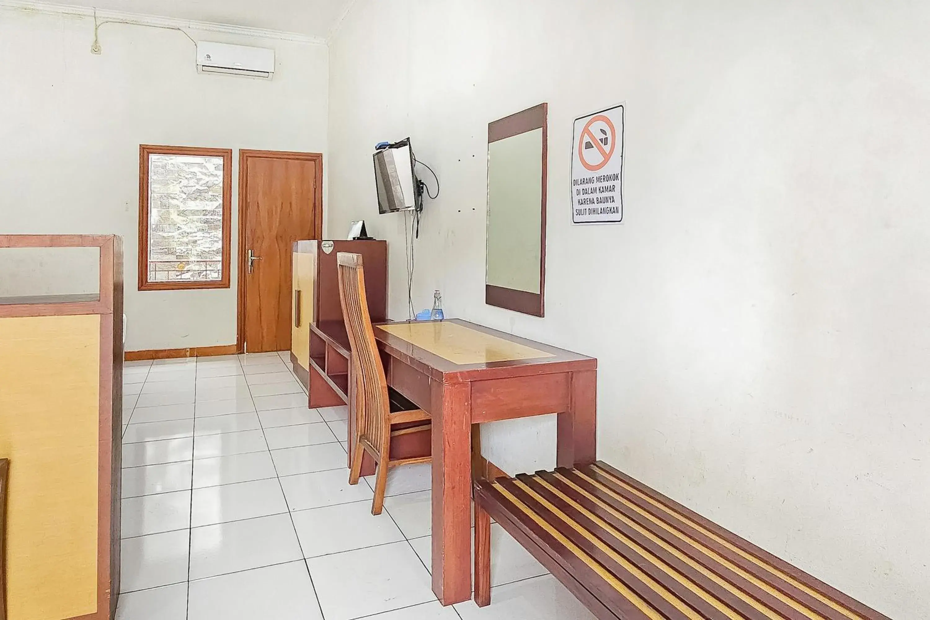 Bedroom in Pandu Prima Guest House Syariah Mitra Reddoorz Bedroom in Pandu Prima Guest House Syariah Mitra Reddoorz