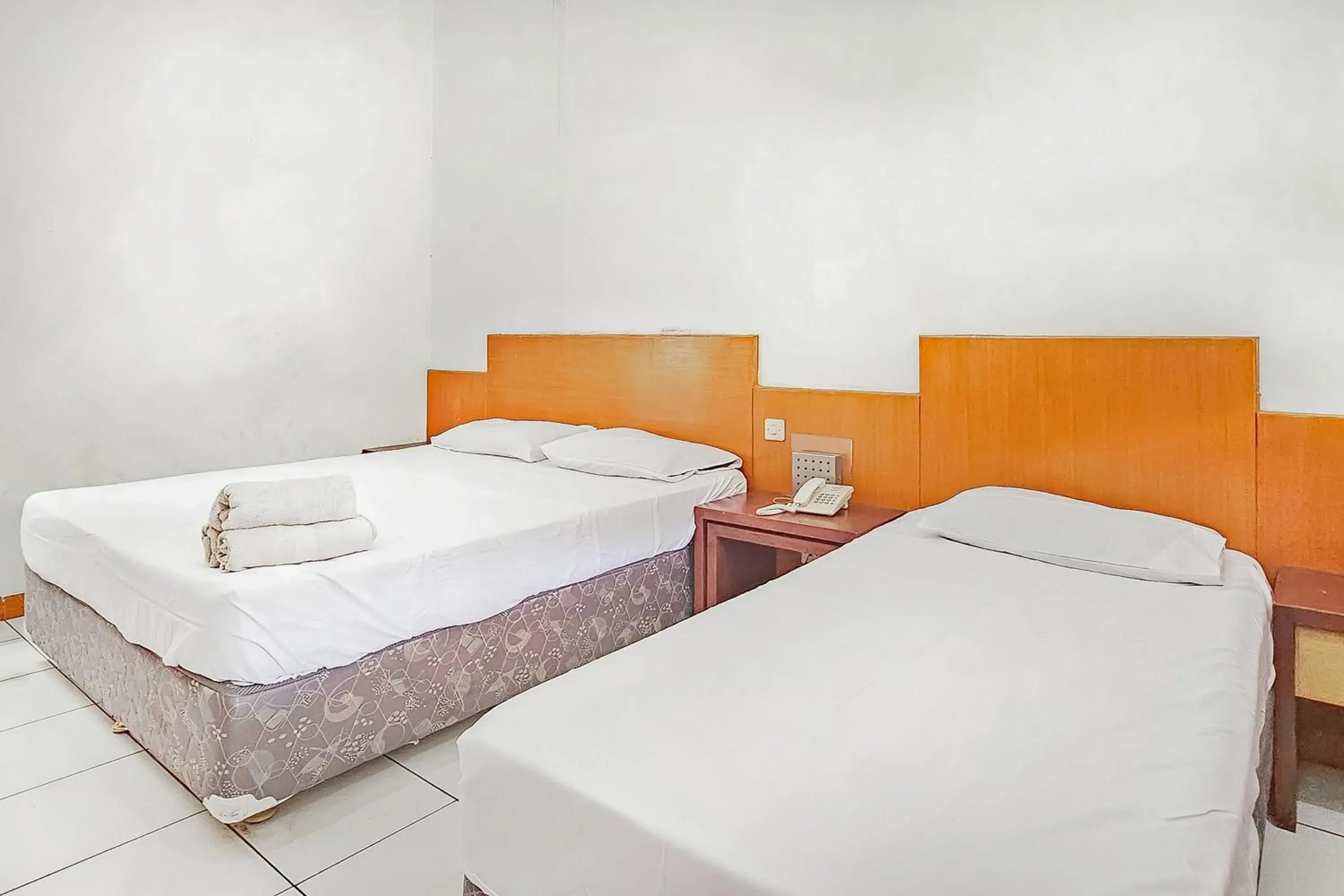 Bed in Pandu Prima Guest House Syariah Mitra Reddoorz Bed in Pandu Prima Guest House Syariah Mitra Reddoorz