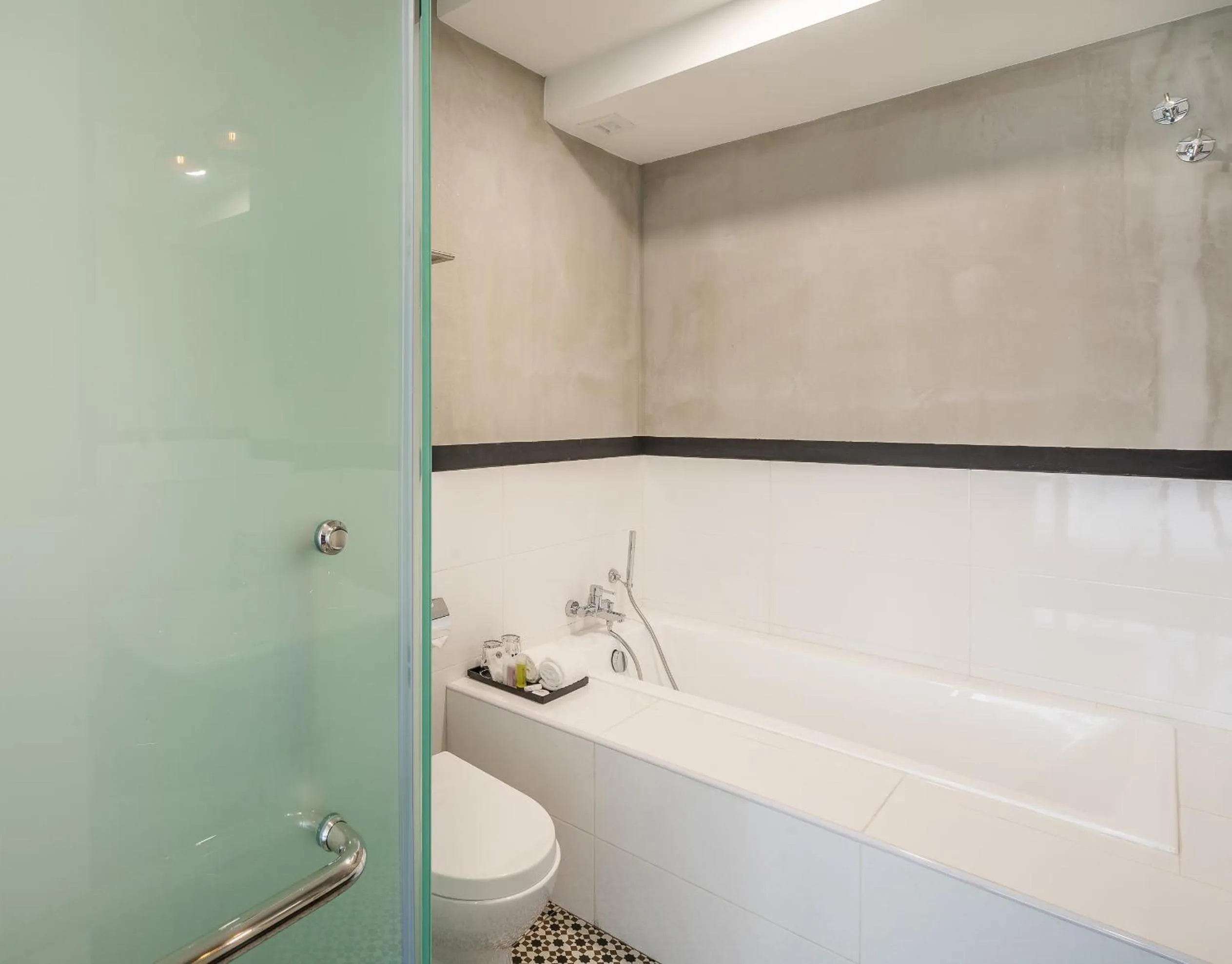 Shower in Treasures Hotel and Suites