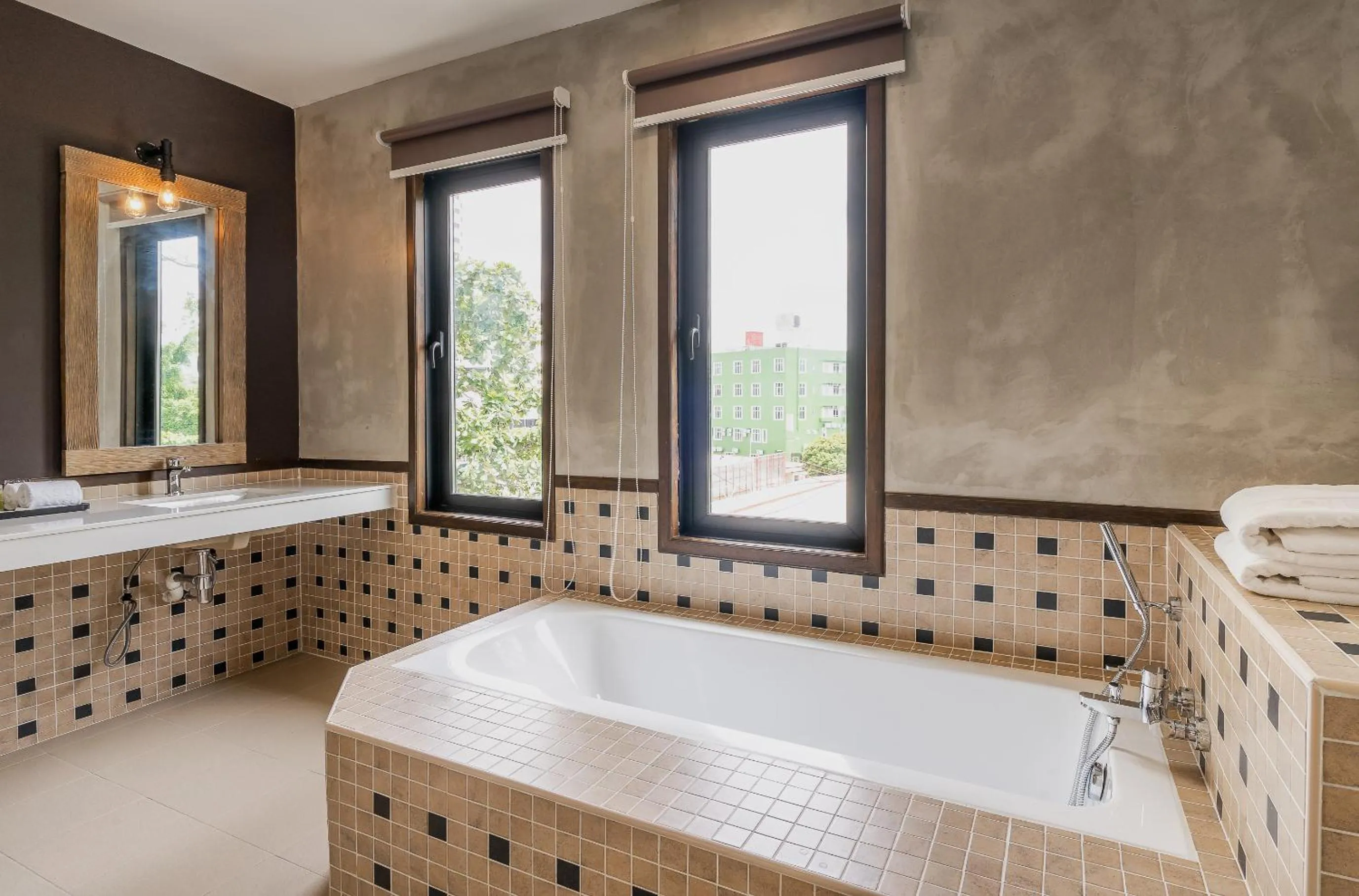 Bath in Treasures Hotel and Suites