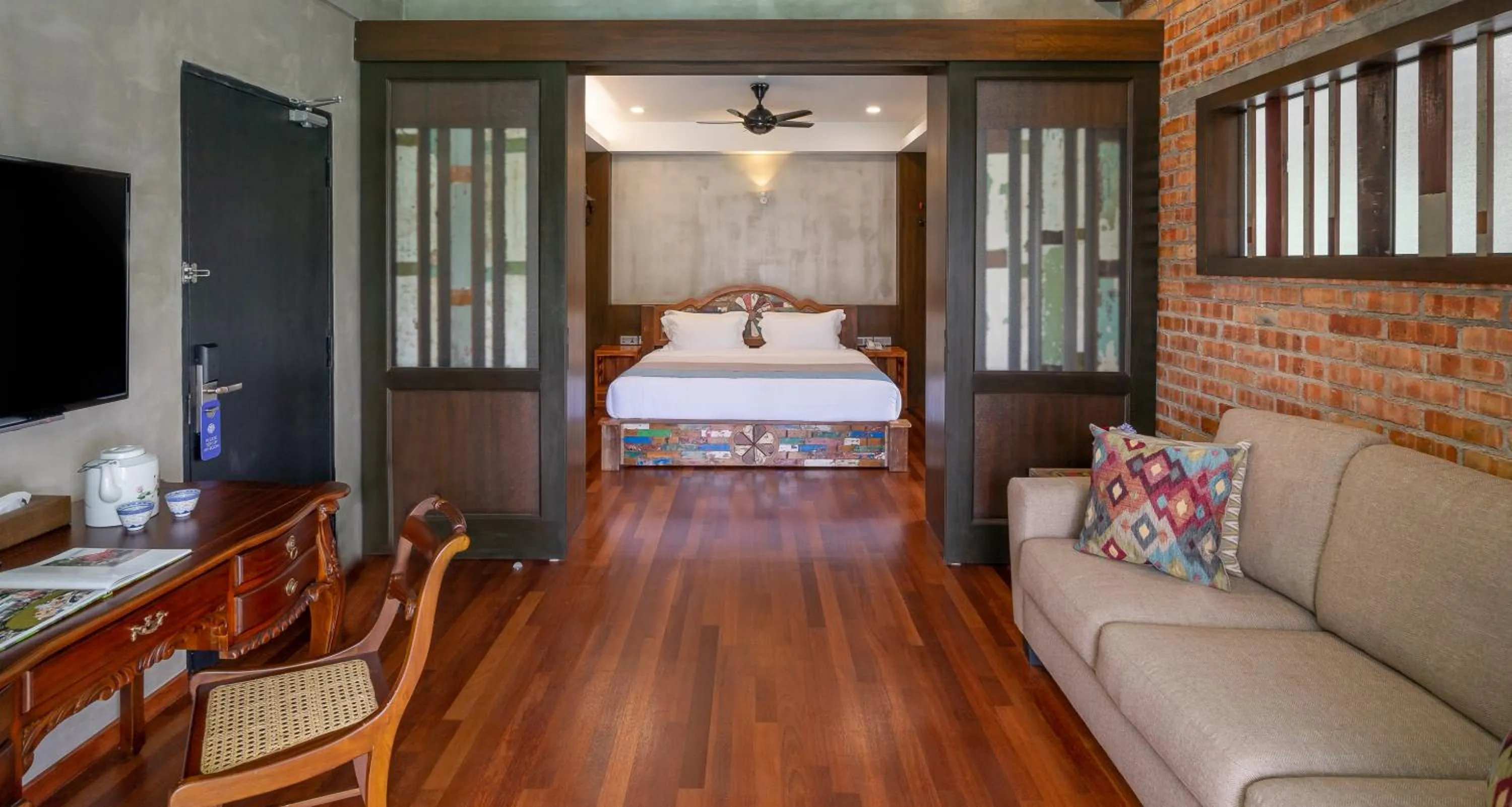 Bed in Treasures Hotel and Suites