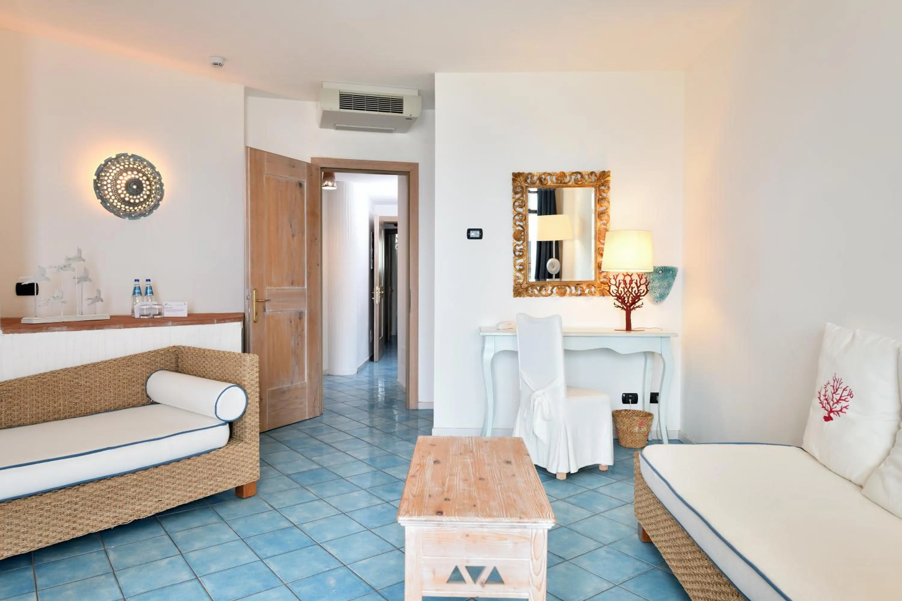 Bedroom in Hotel Resort & Spa Baia Caddinas