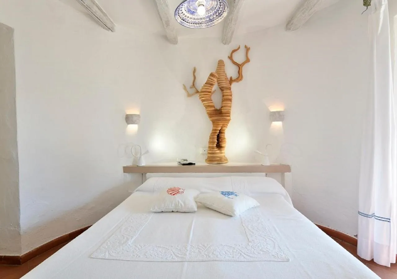 Bedroom, Bed in Hotel Resort & Spa Baia Caddinas