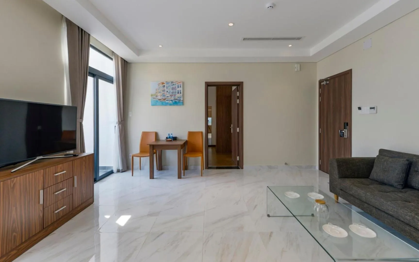 Communal lounge/ TV room in Aurora Serviced Apartments