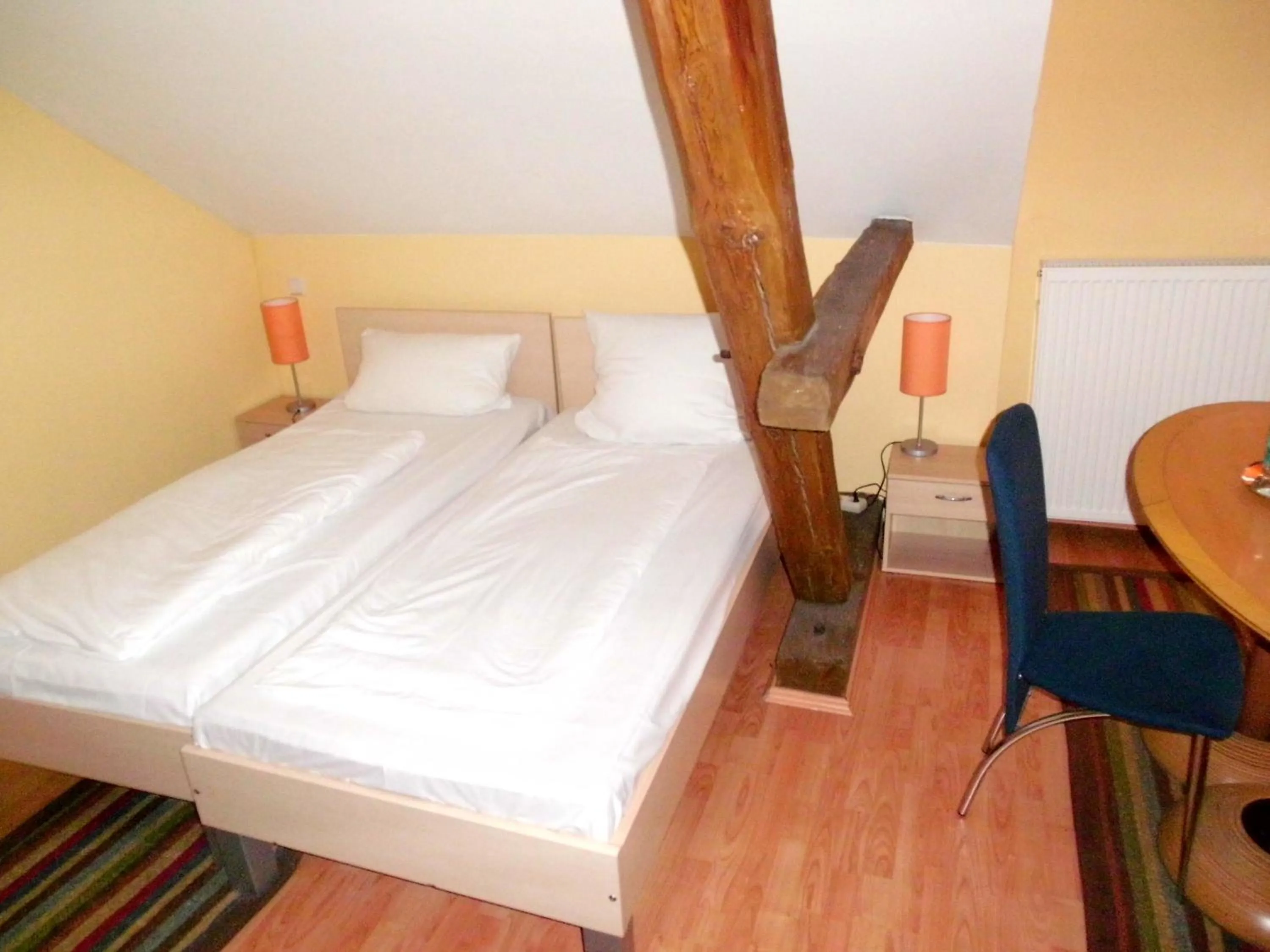 Bed in HAHNE'S Hotel and Boarding