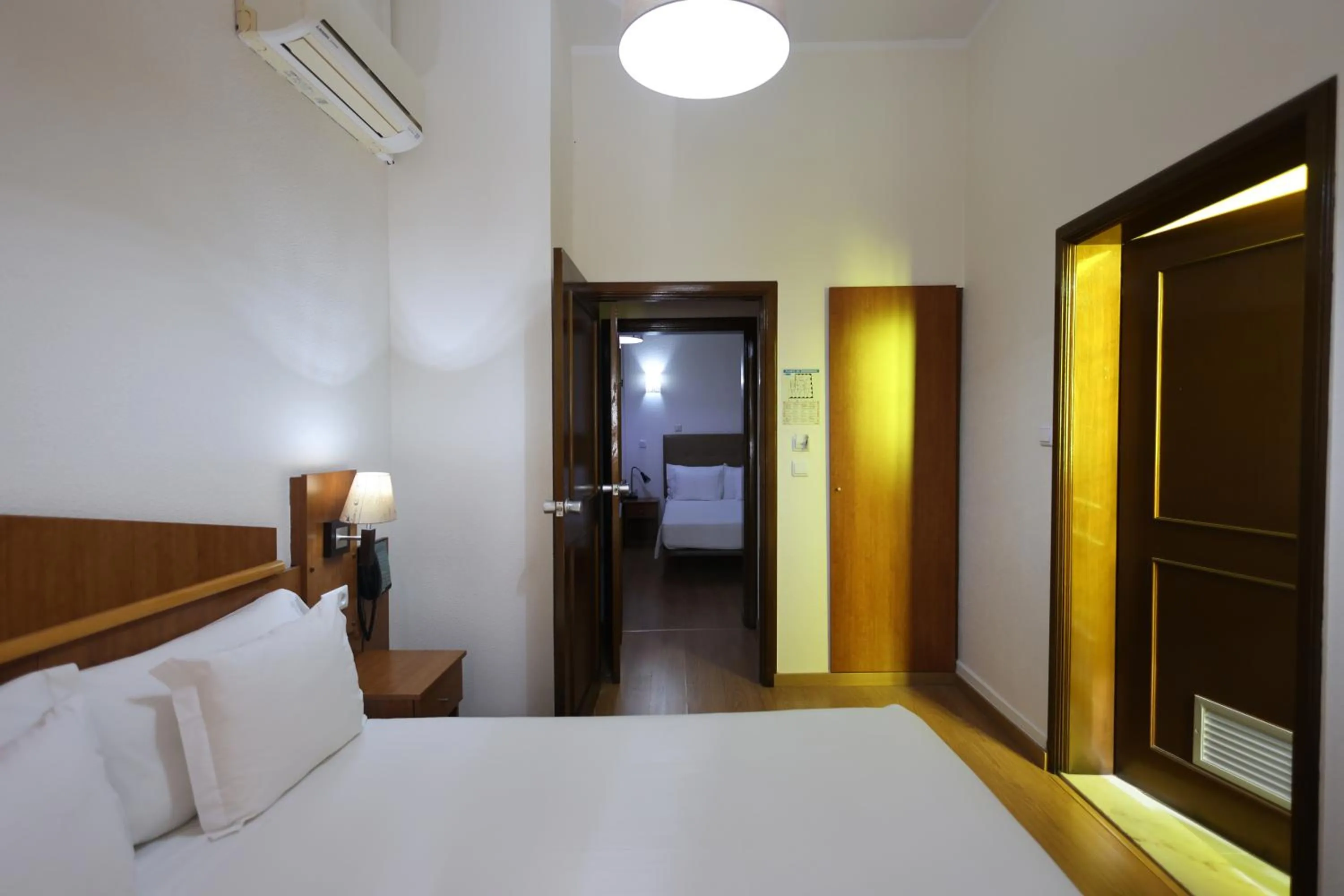 Bed in Pensao Praca Da Figueira