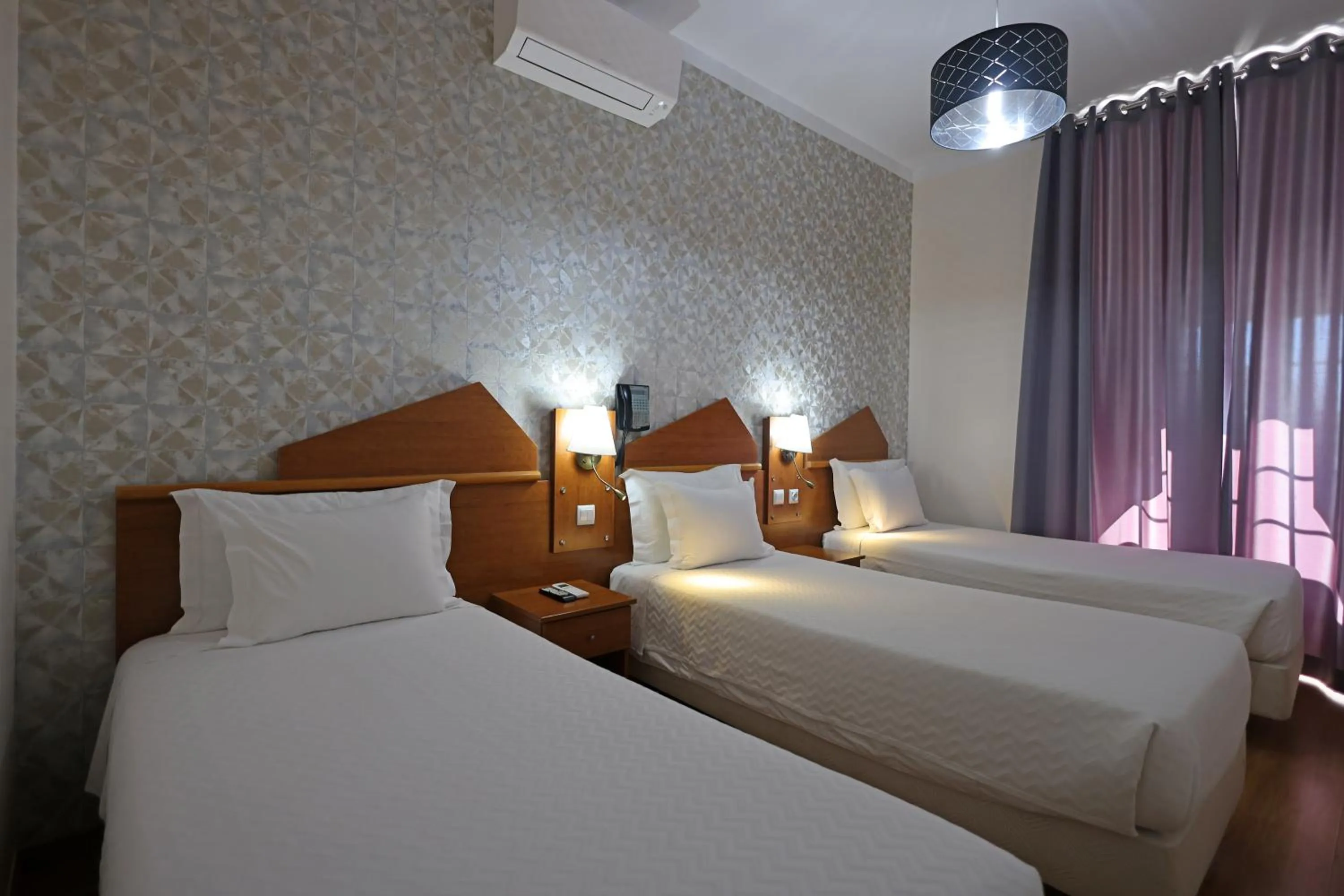 Bed in Pensao Praca Da Figueira