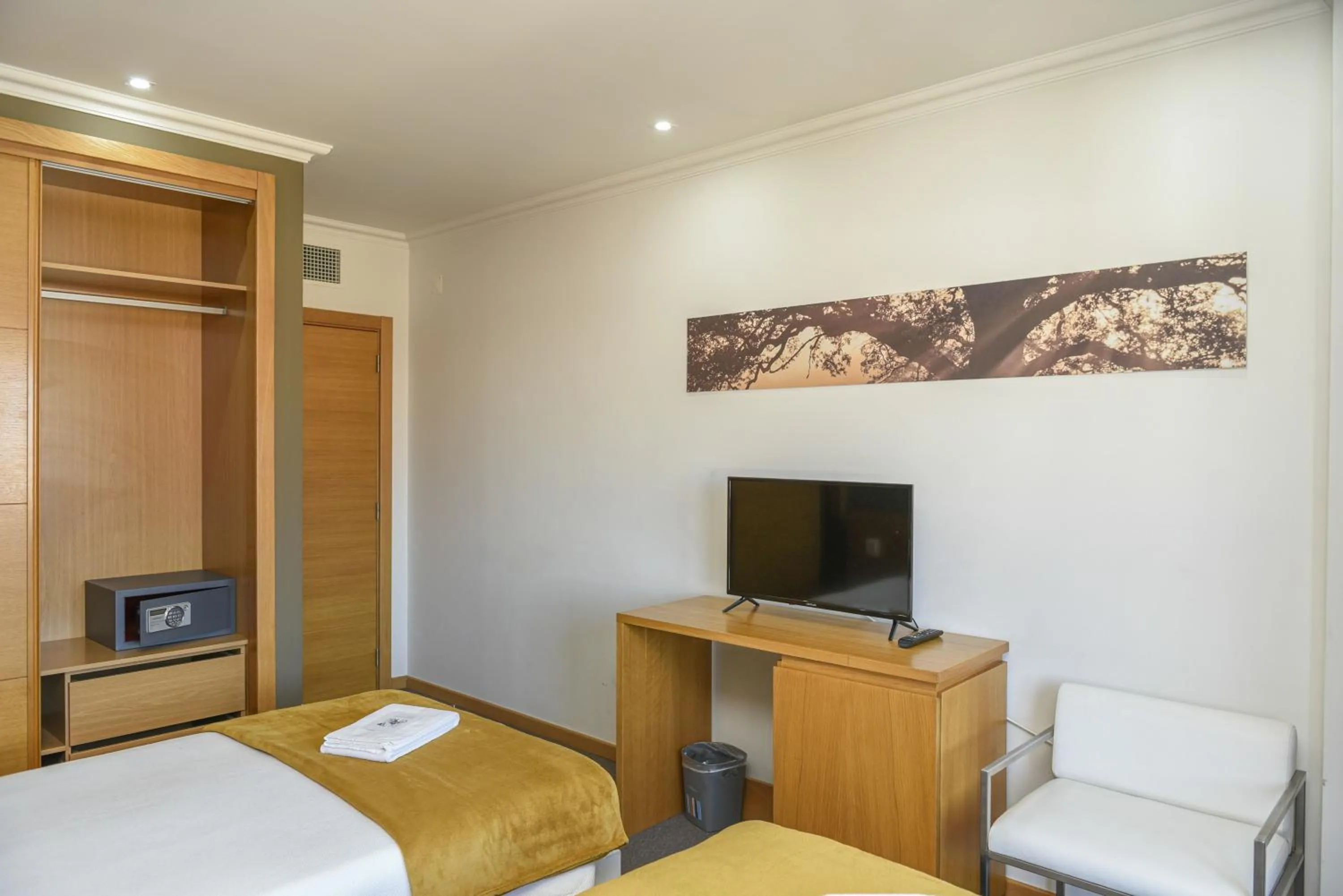 Bed in Dom Joao Hotel