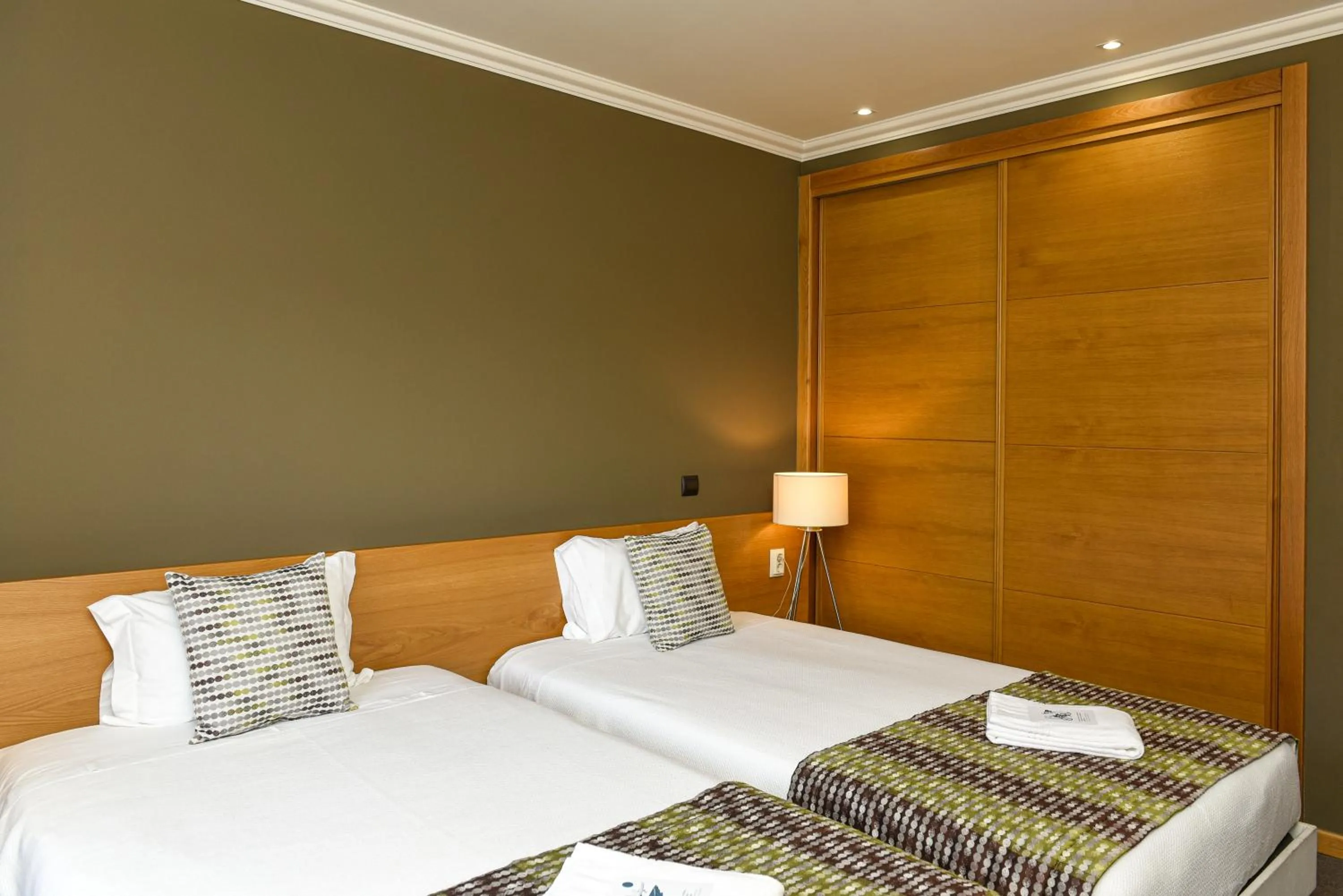 Bed in Dom Joao Hotel