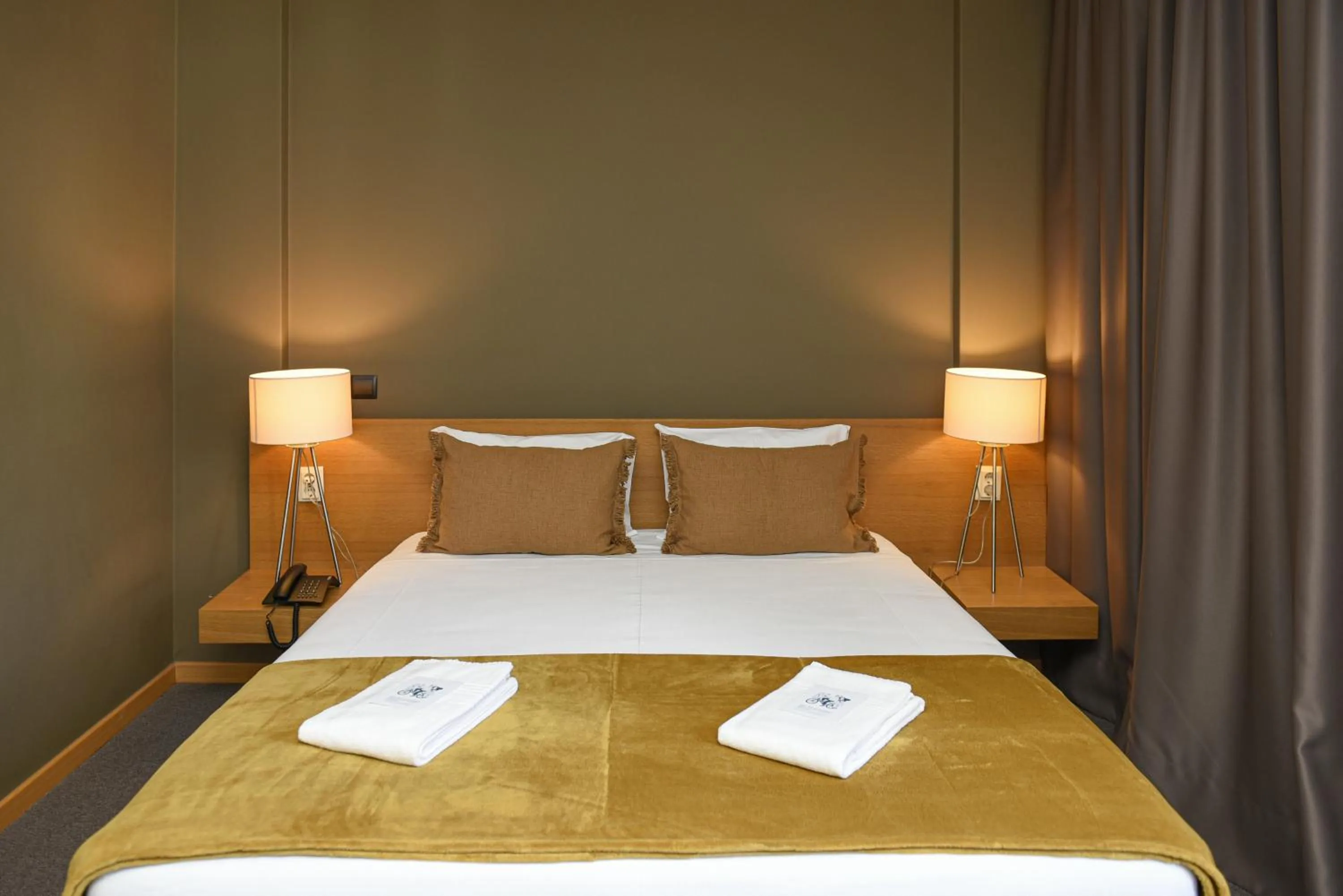 Bed in Dom Joao Hotel