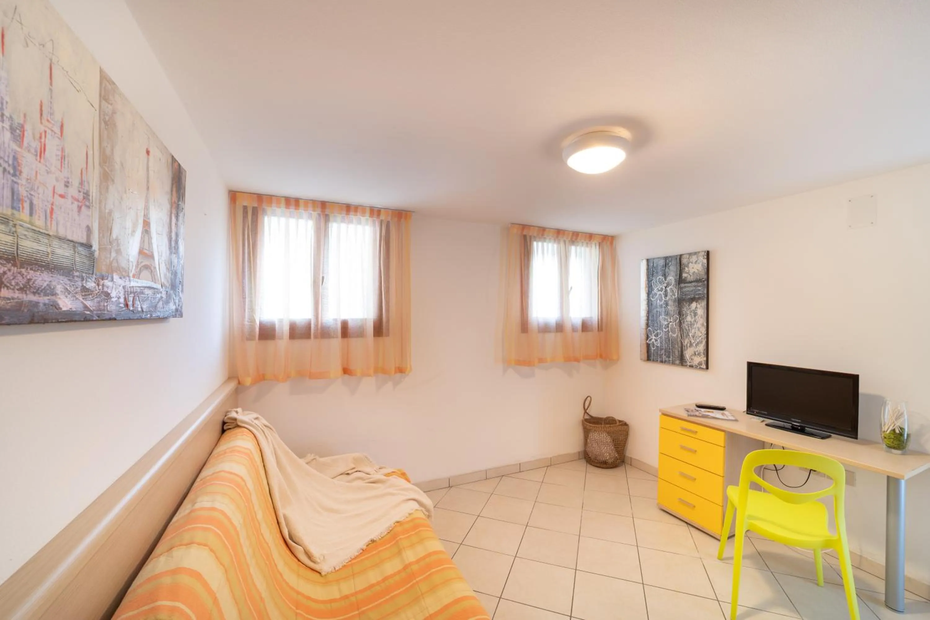 Living room, Bed in Villaggio Club dei Pini