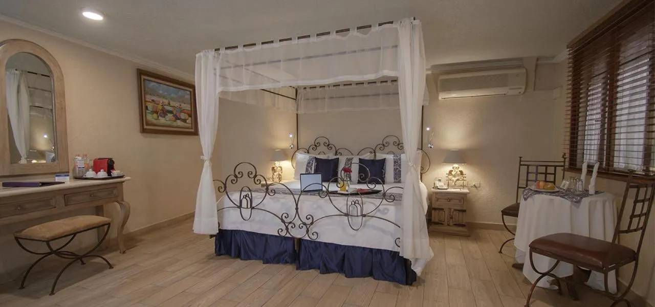 Photo of the whole room, Bed in Arcángel Puebla