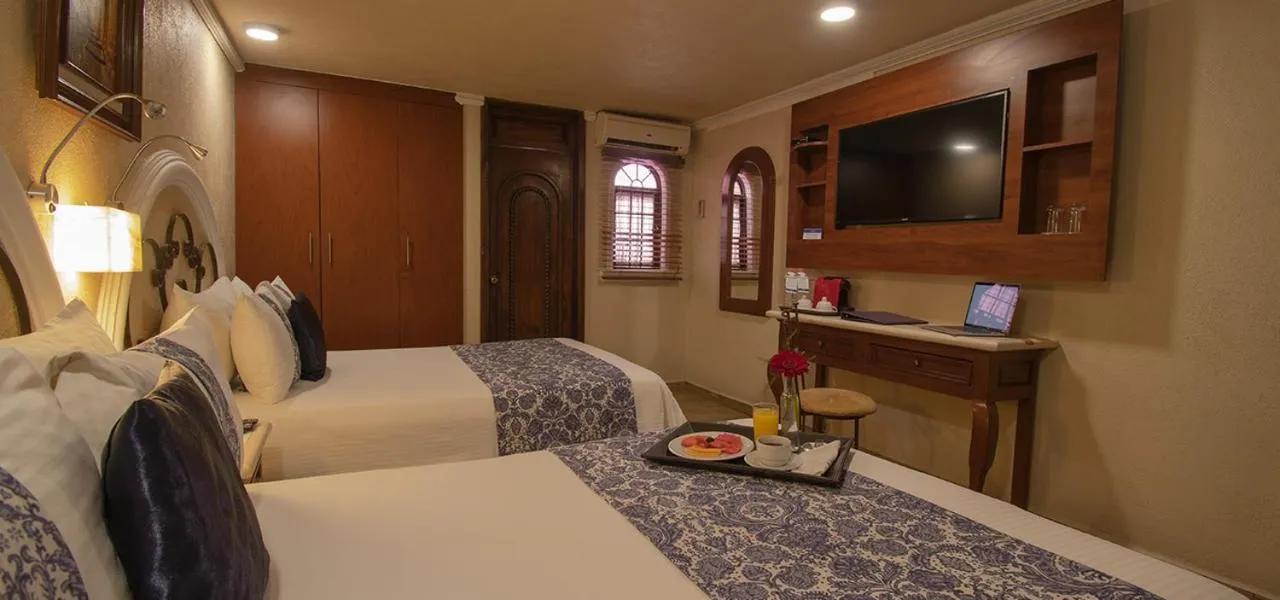 Photo of the whole room, Bed in Arcángel Puebla