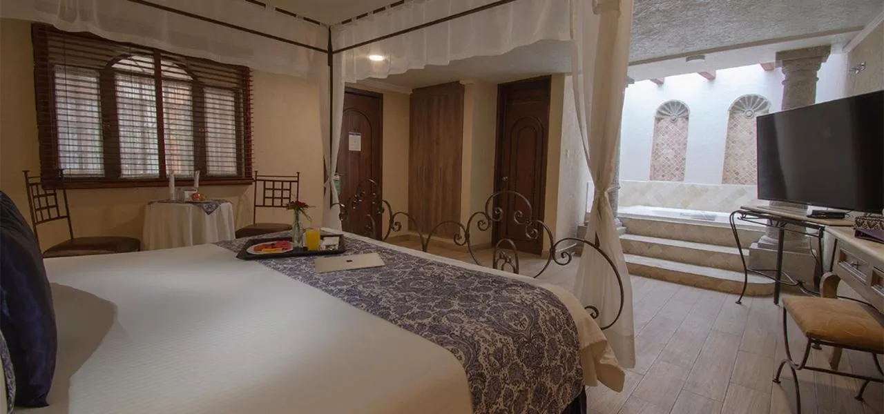 Photo of the whole room, Bed in Arcángel Puebla