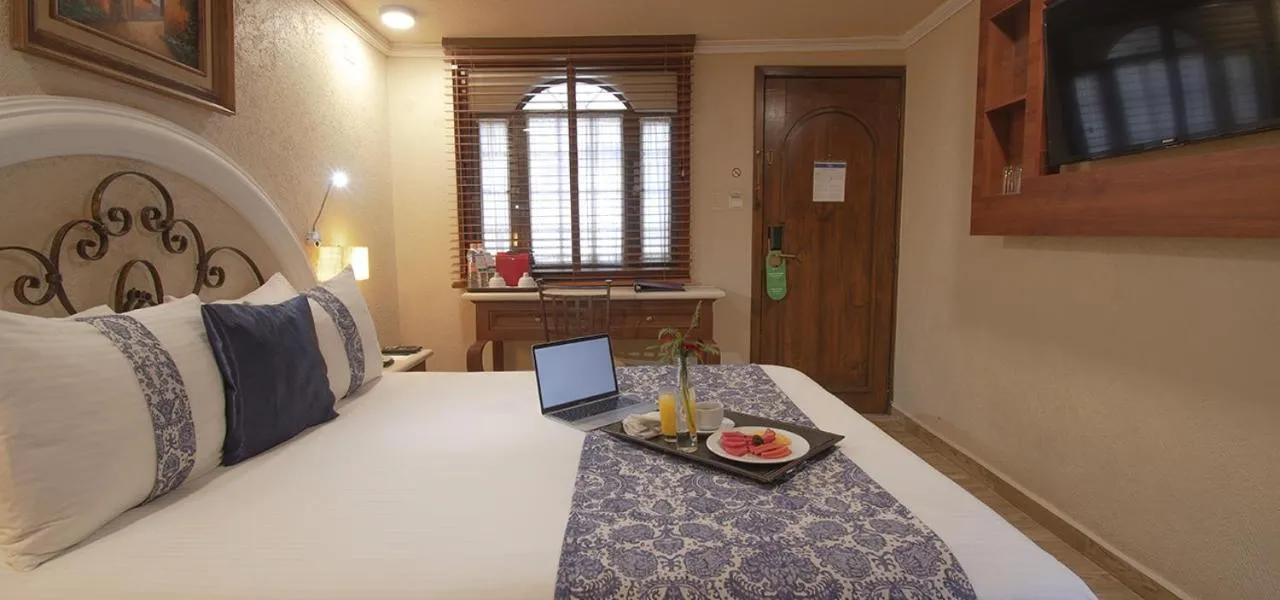 Photo of the whole room, Bed in Arcángel Puebla