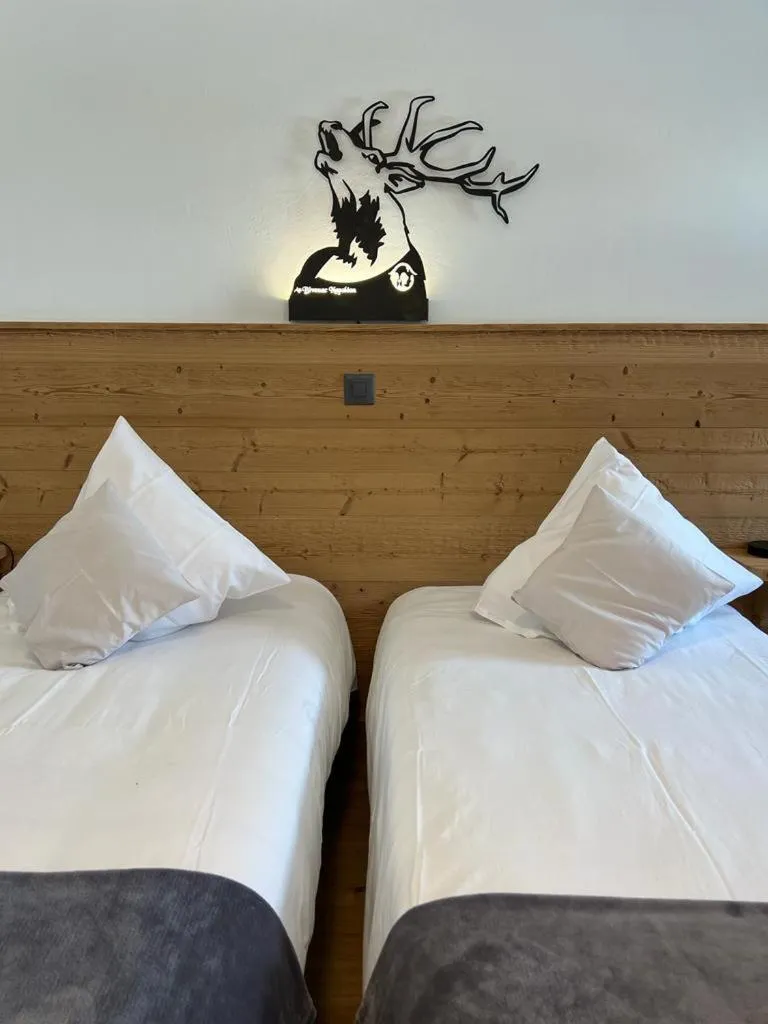 Bed in Au Bivouac de Napoléon et Spa