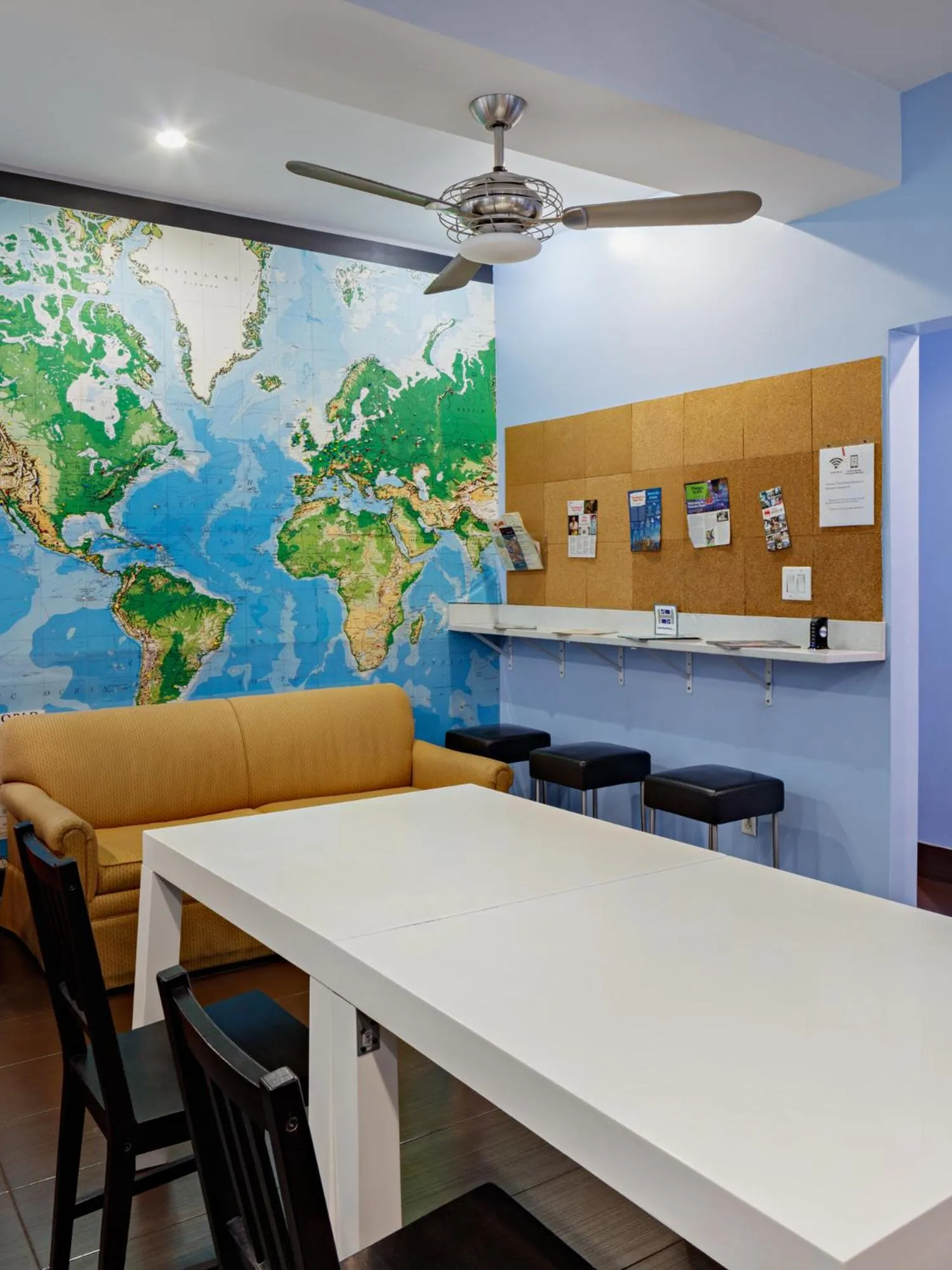 Communal lounge/ TV room in Central Park West Hostel