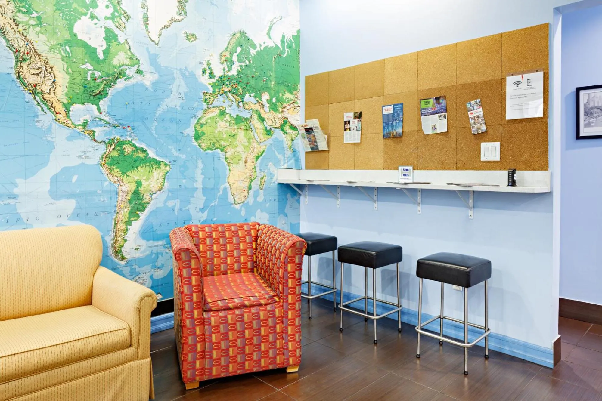 Communal lounge/ TV room in Central Park West Hostel