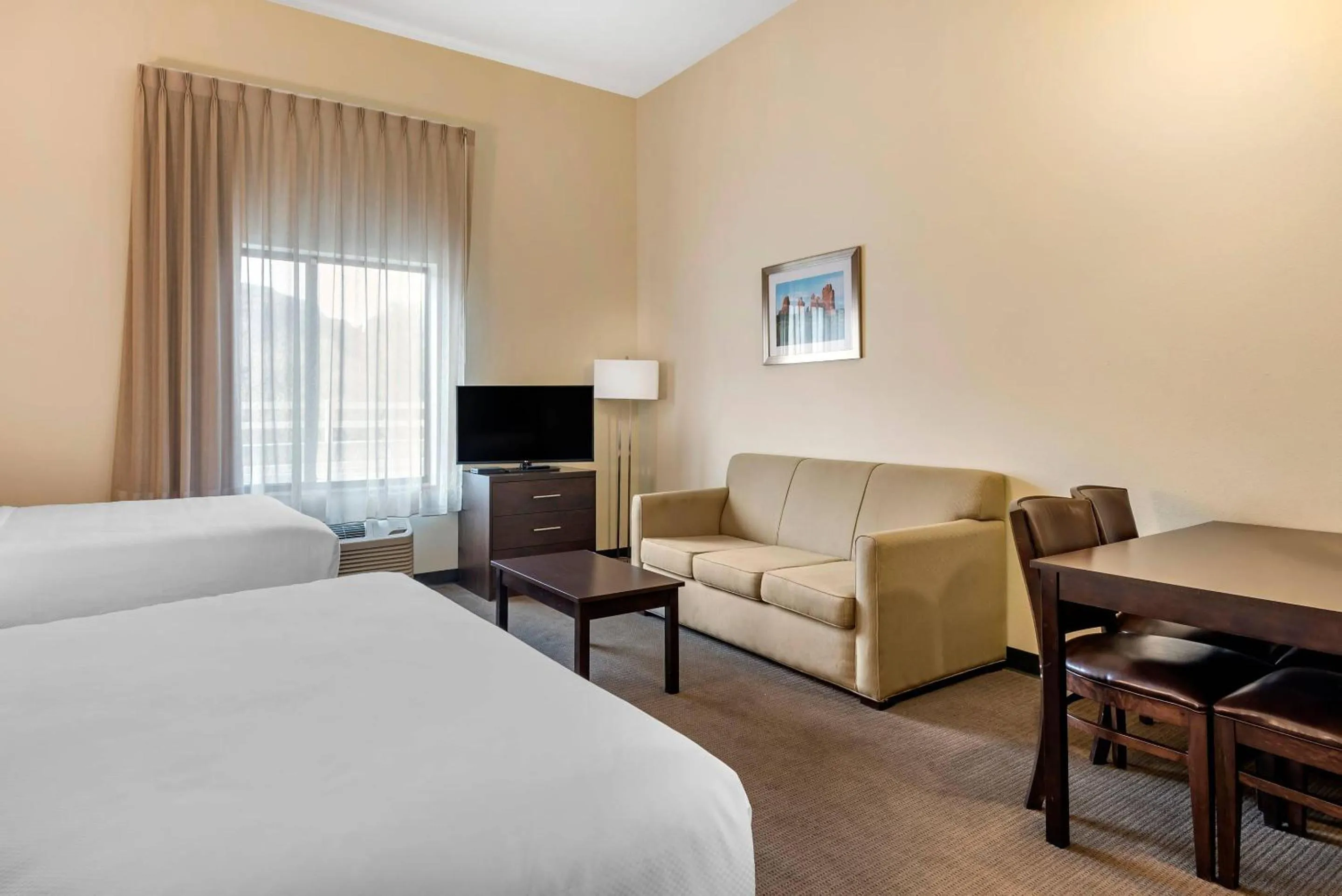 Bedroom, Bed in MainStay Suites Moab near Arches National Park