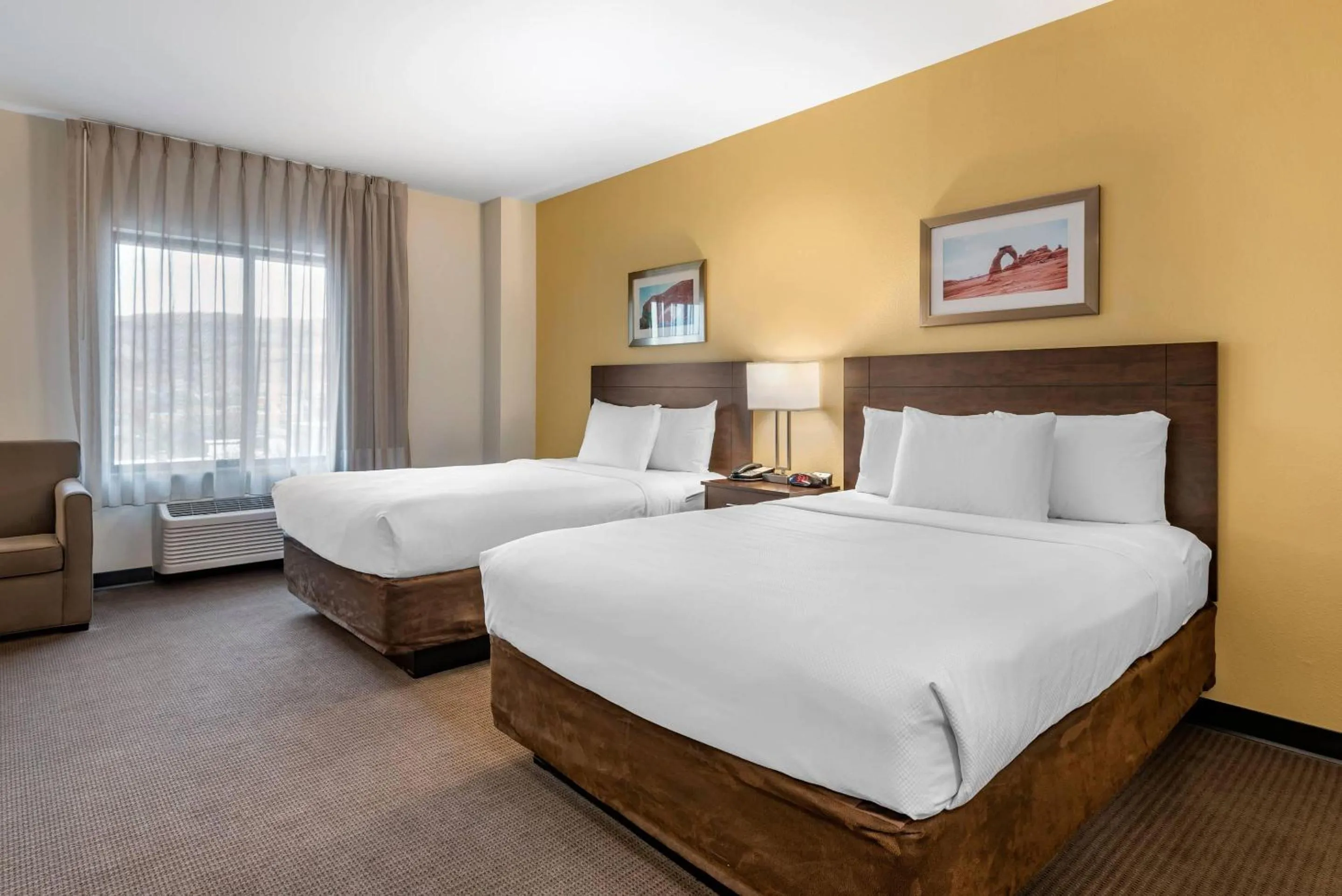 Bedroom, Bed in MainStay Suites Moab near Arches National Park