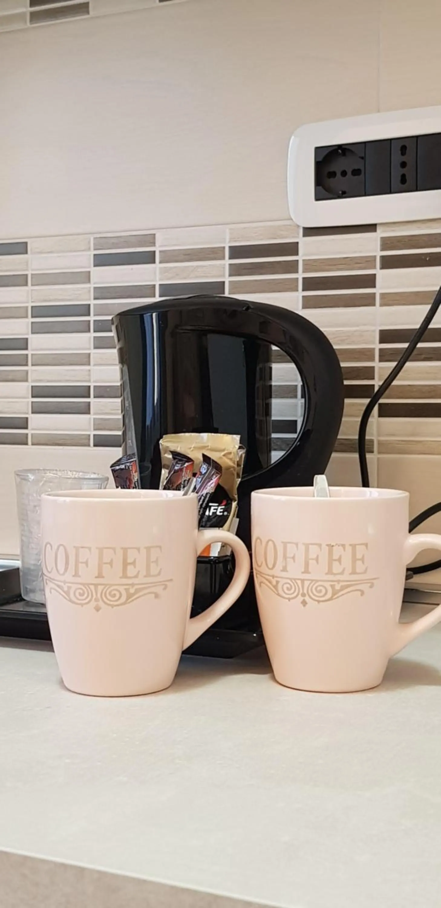 Coffee/tea facilities in Il Giardino dei Limoni Room & Apartments