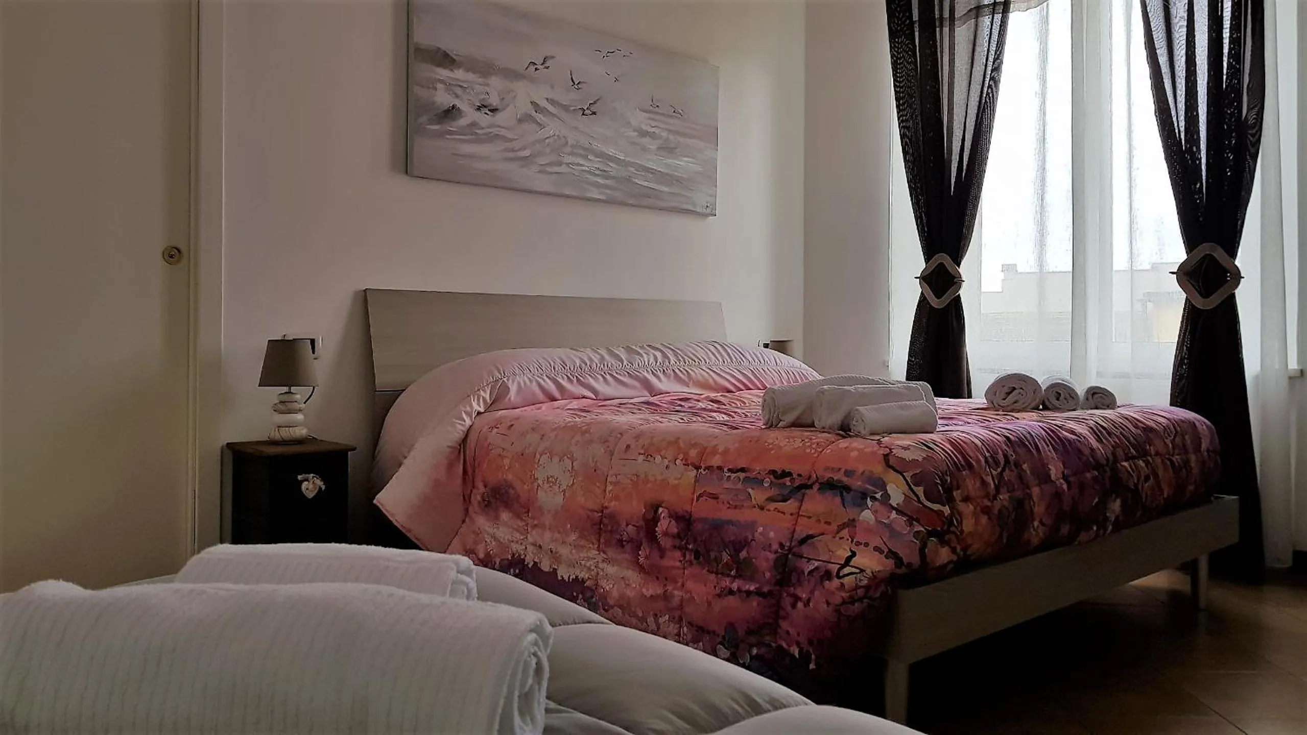 Bed in Il Giardino dei Limoni Room & Apartments