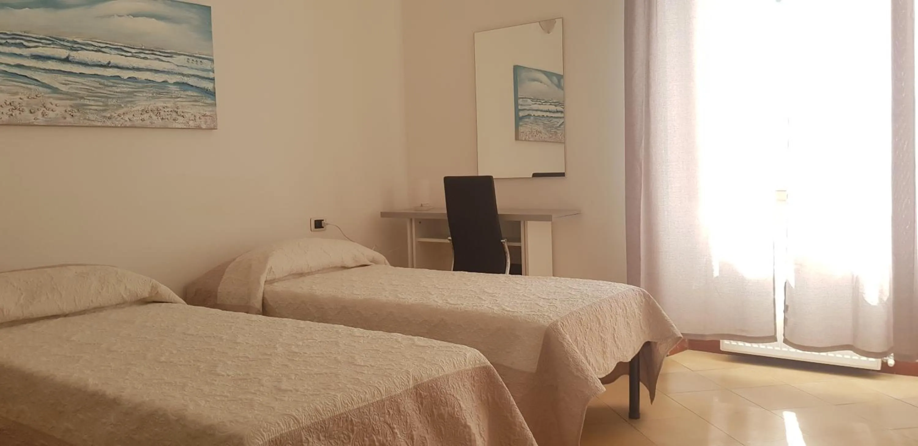 Bed in Il Giardino dei Limoni Room & Apartments