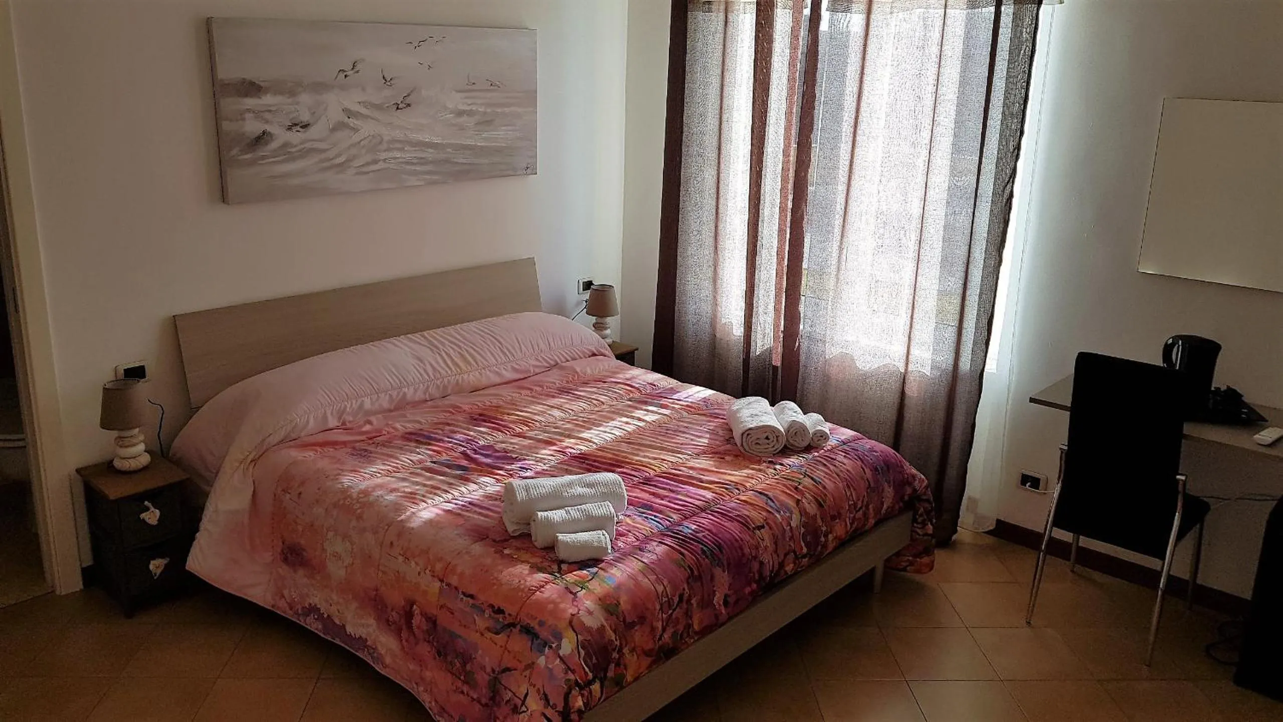 Bed in Il Giardino dei Limoni Room & Apartments