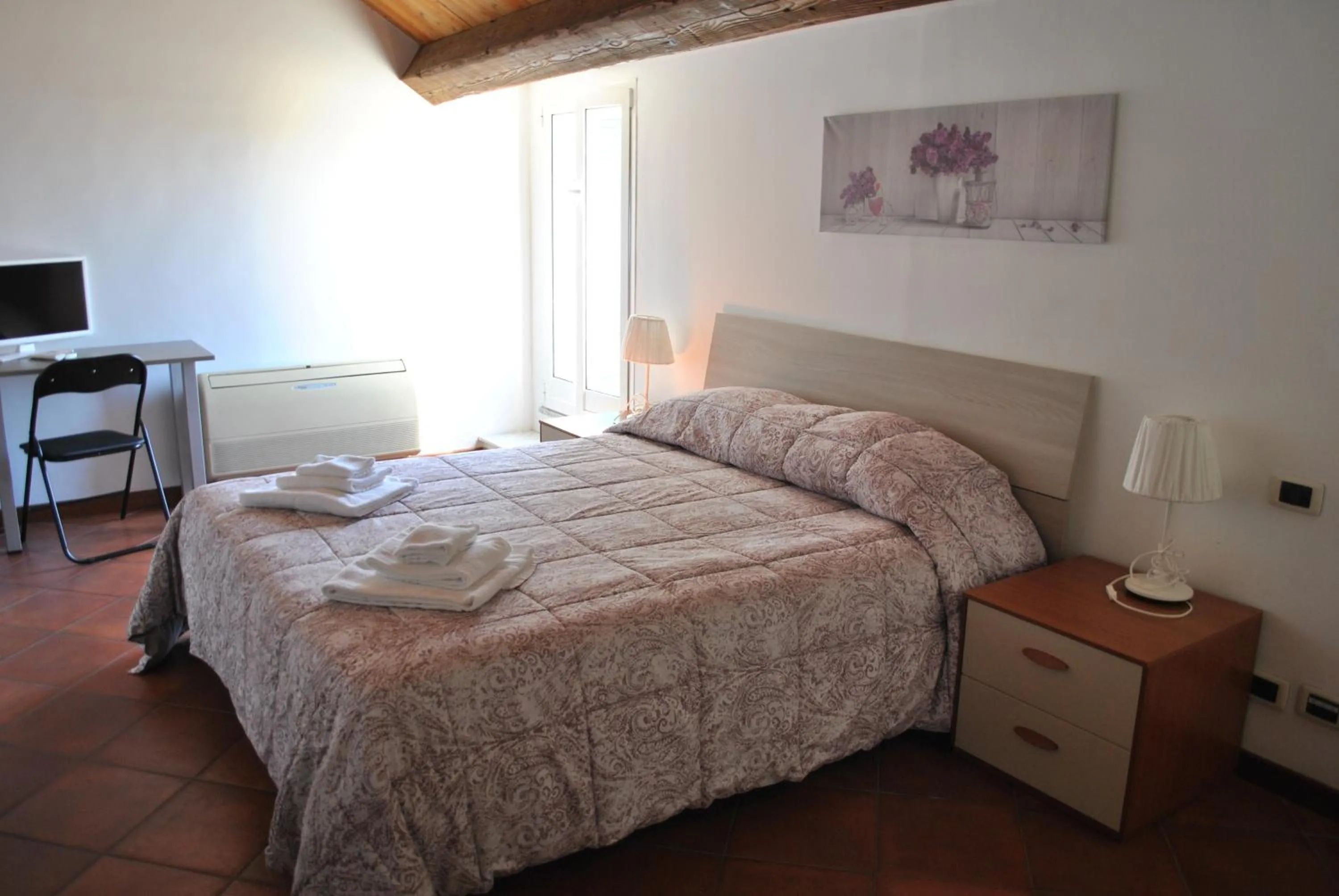 Bed in Il Giardino dei Limoni Room & Apartments