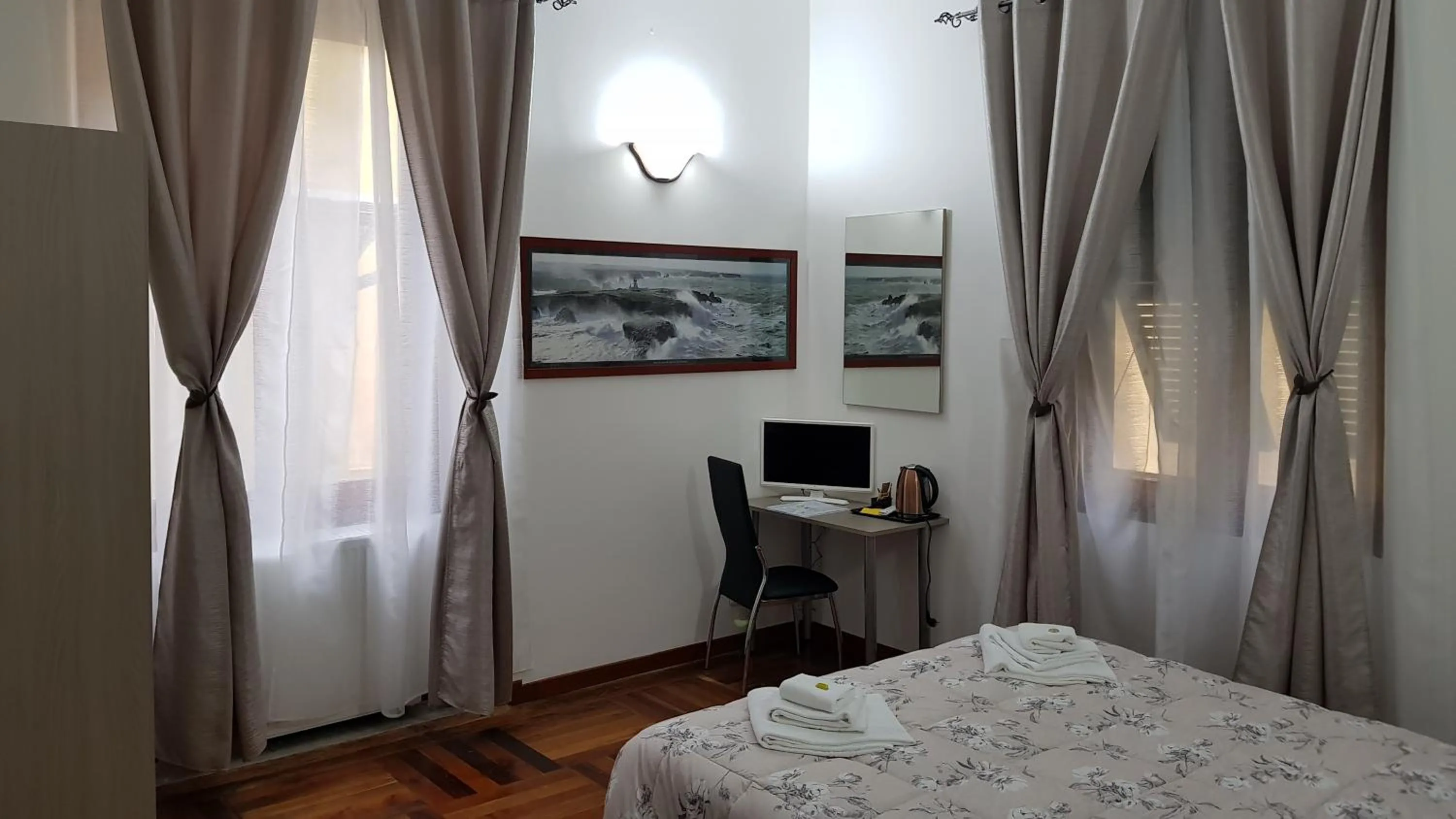 Bed in Il Giardino dei Limoni Room & Apartments