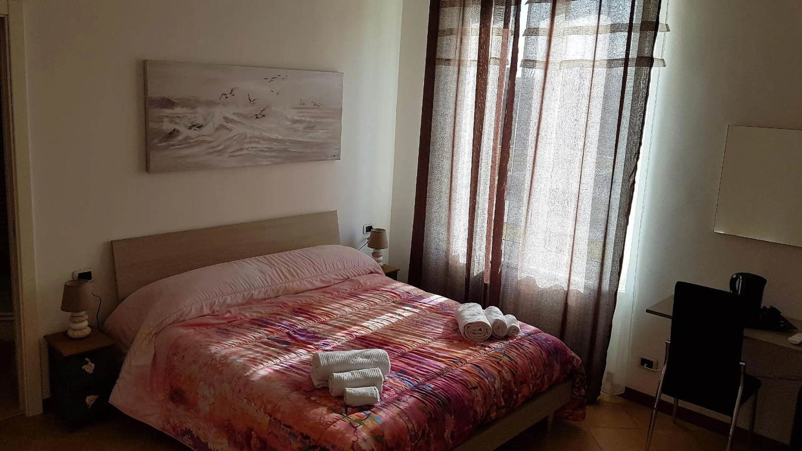 Bed in Il Giardino dei Limoni Room & Apartments