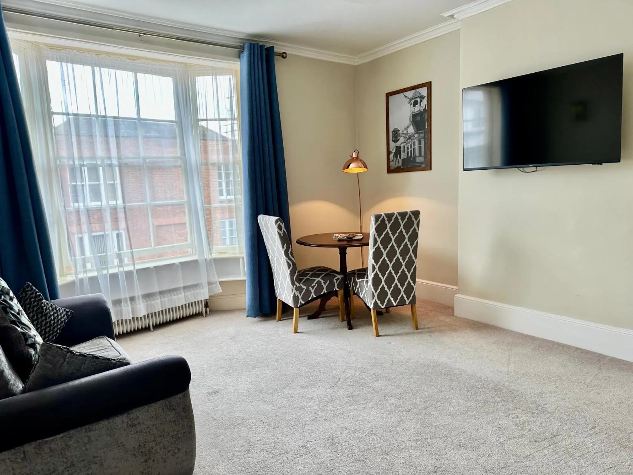 Communal lounge/ TV room in The Angel Posting House & Livery