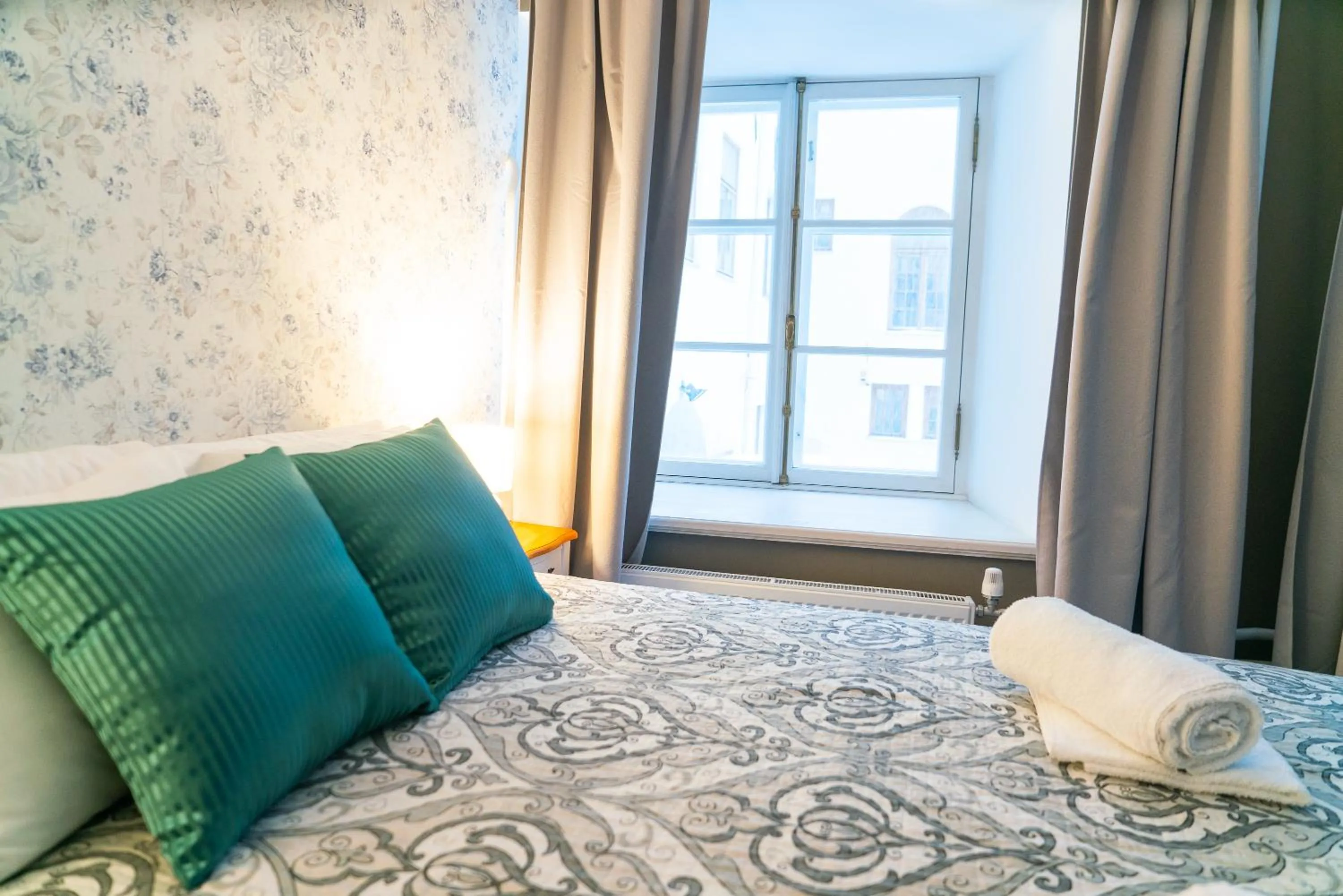 Bed in Godart Rooms Guesthouse