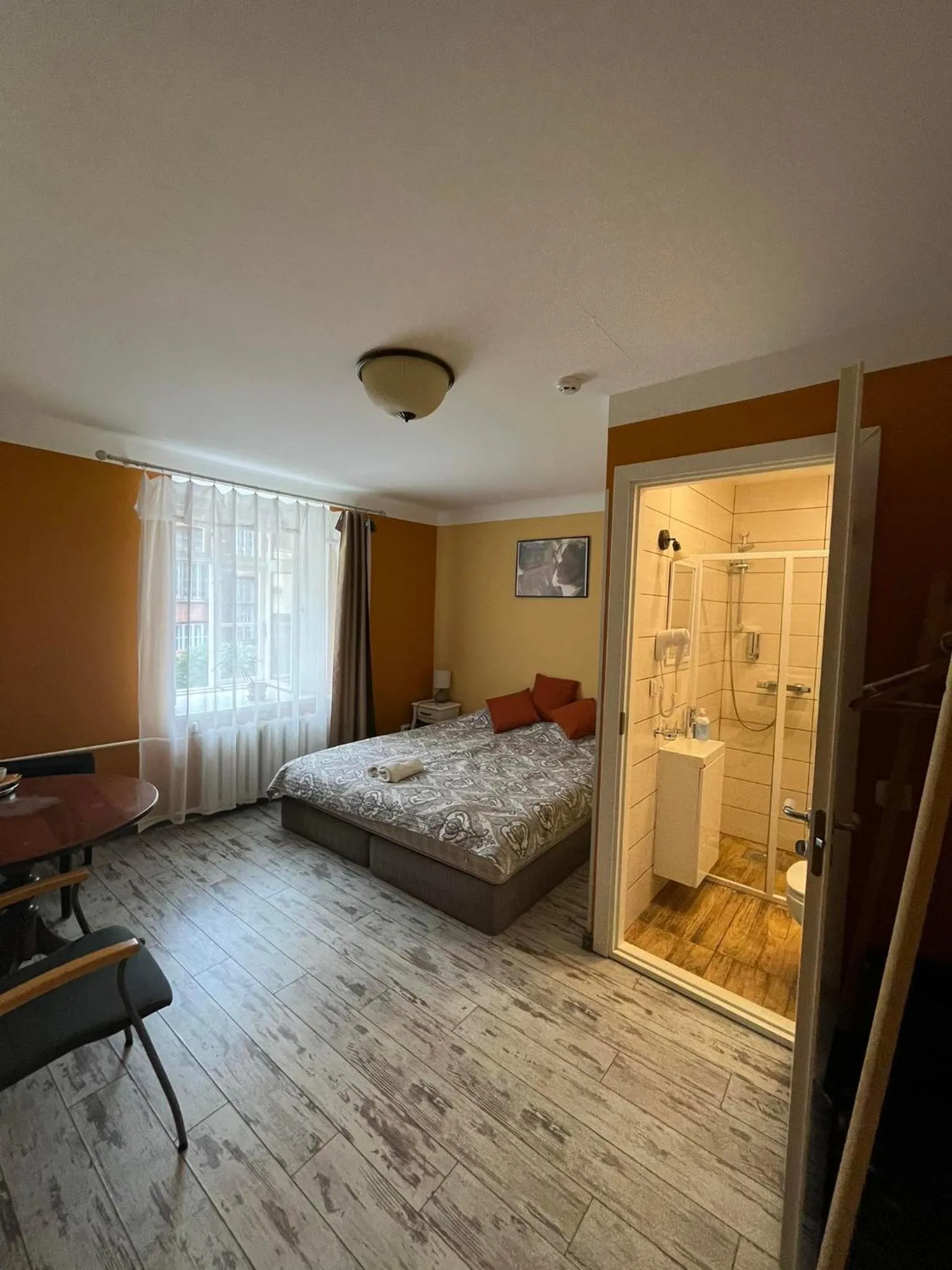 Bed in Godart Rooms Guesthouse