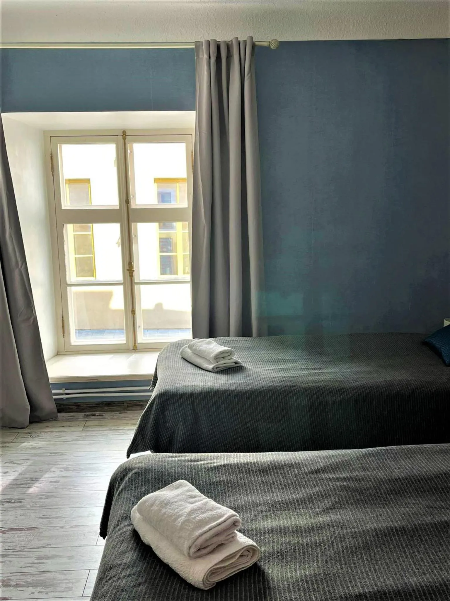 Bed in Godart Rooms Guesthouse