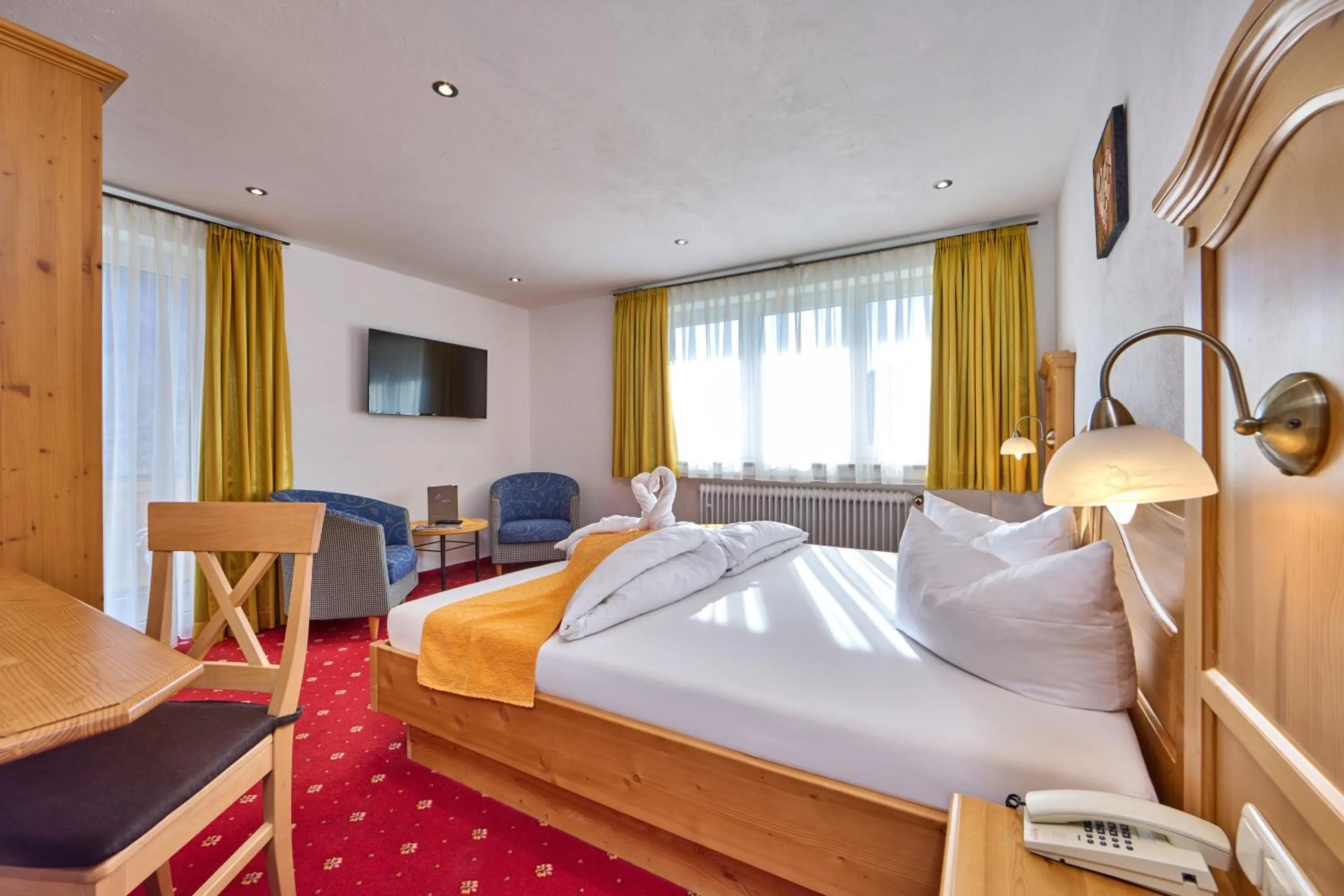 Bed in Alpenhotel Rieger