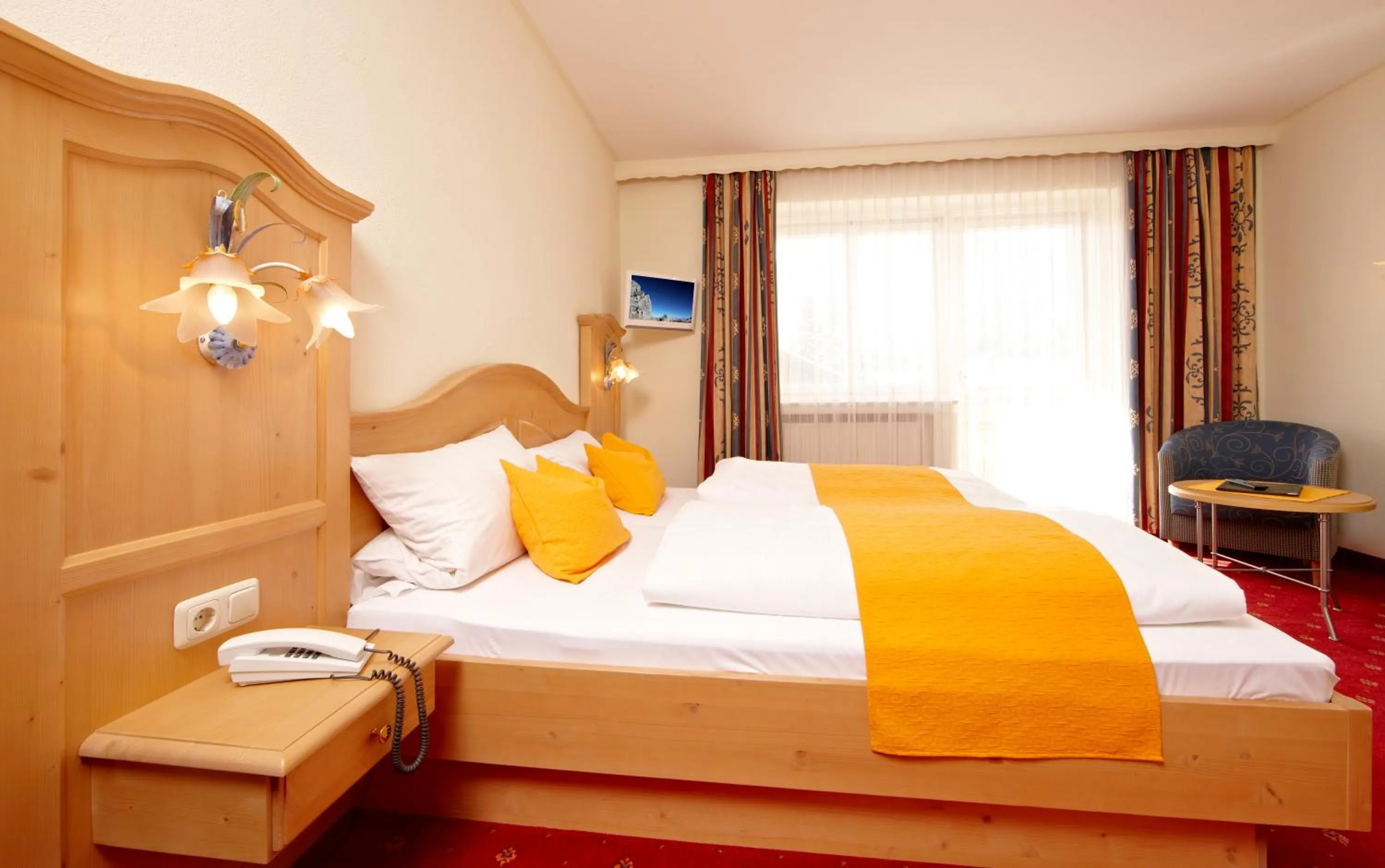 Photo of the whole room, Bed in Alpenhotel Rieger